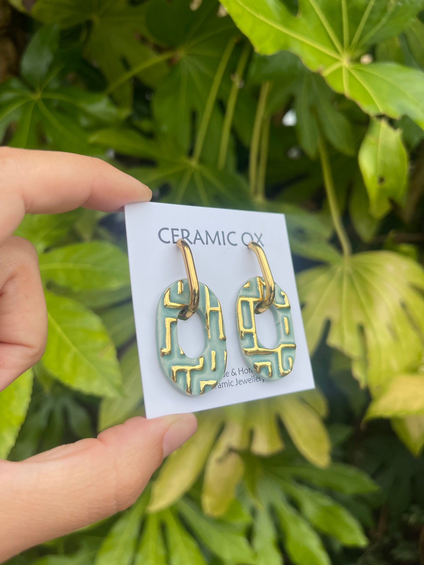 Jade patterned oval hoops