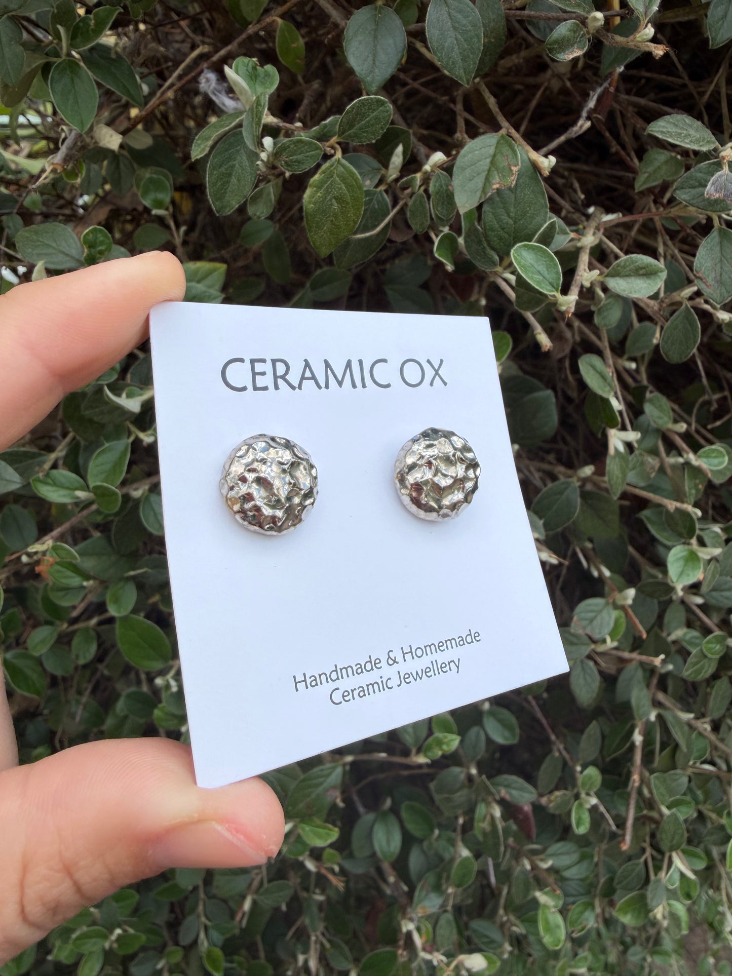 Textured round studs in silver