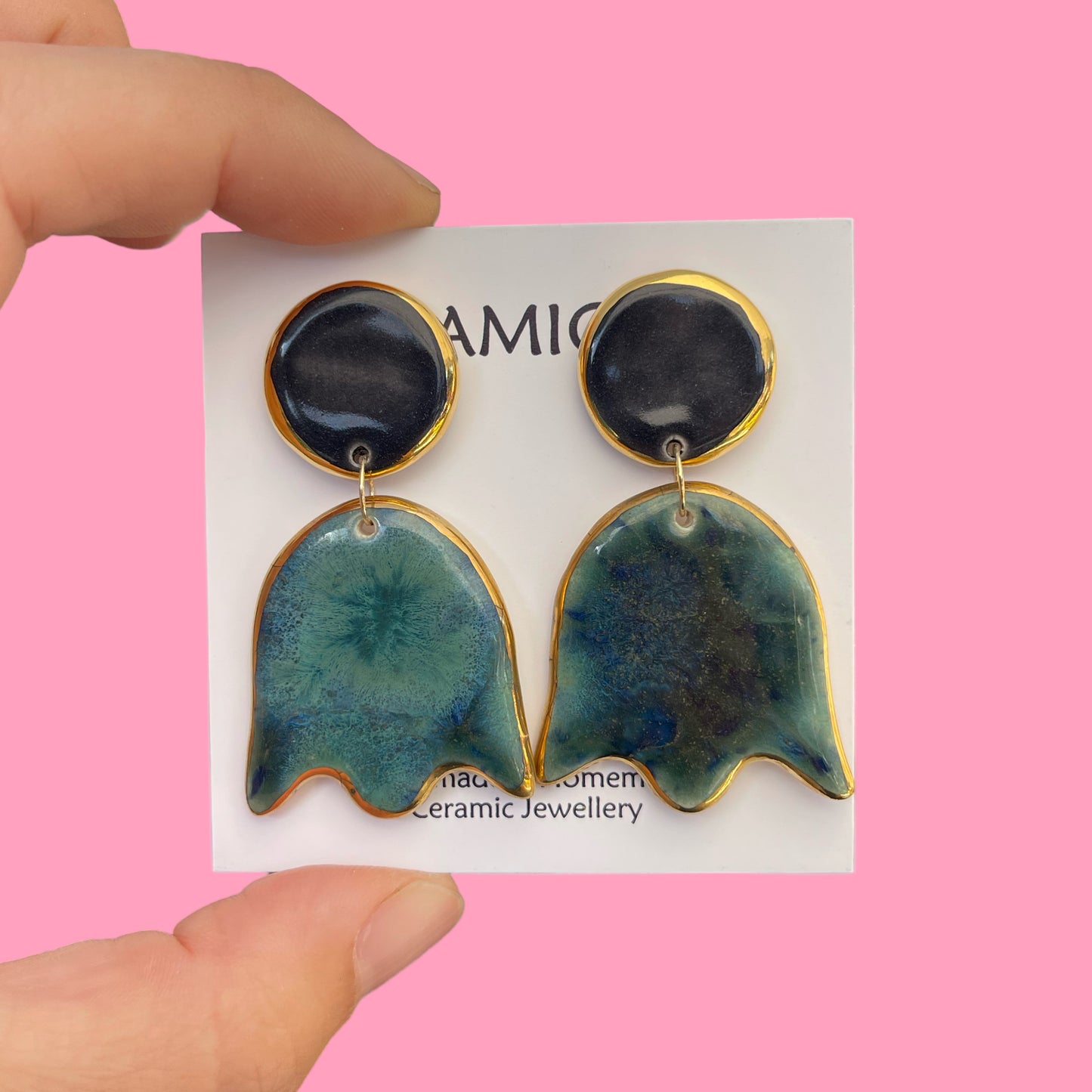 Dangle flower in night sky with circle studs.