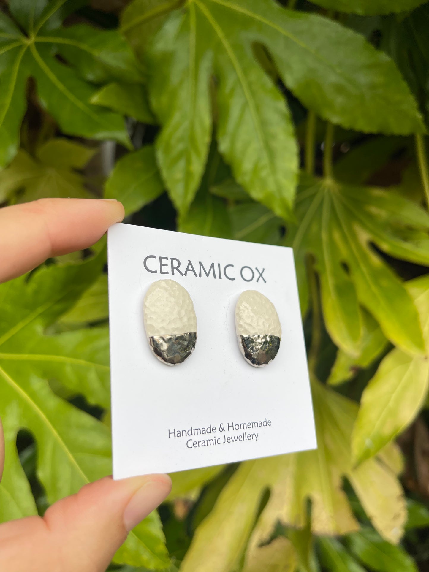 Convex textured white studs dipped silver