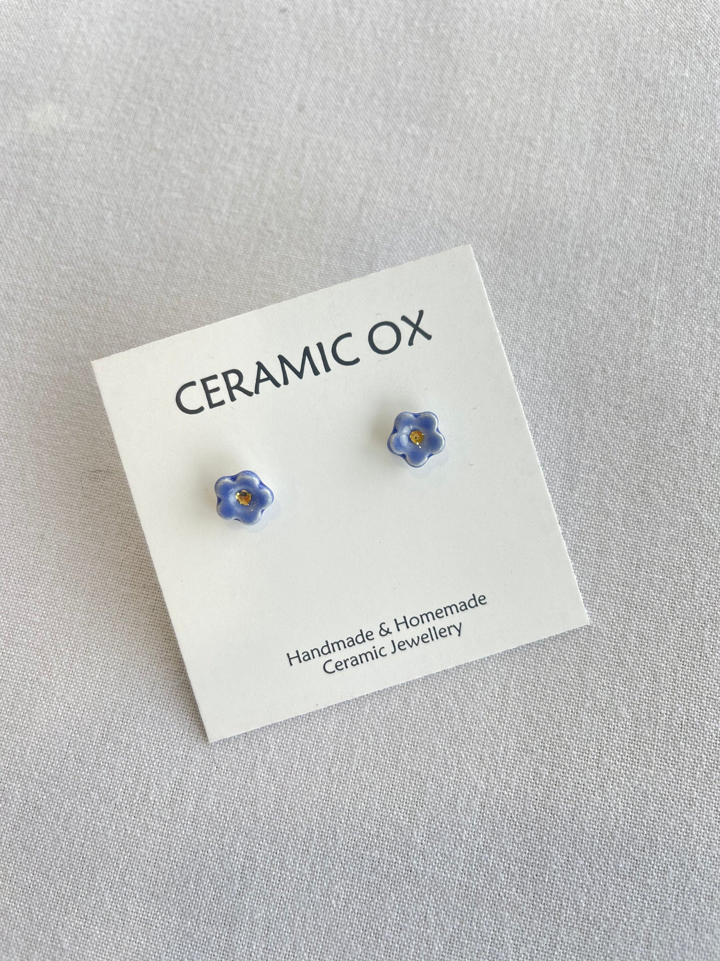 Blue flower studs