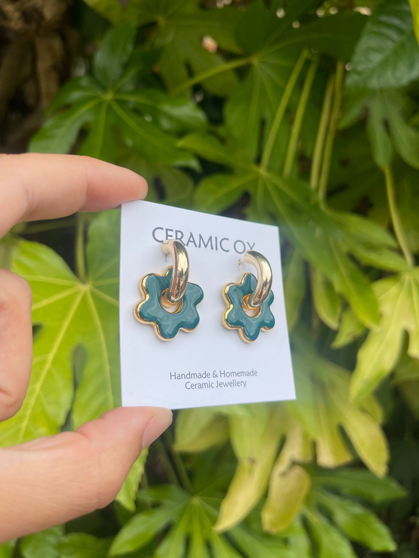 Teal flower Hoops