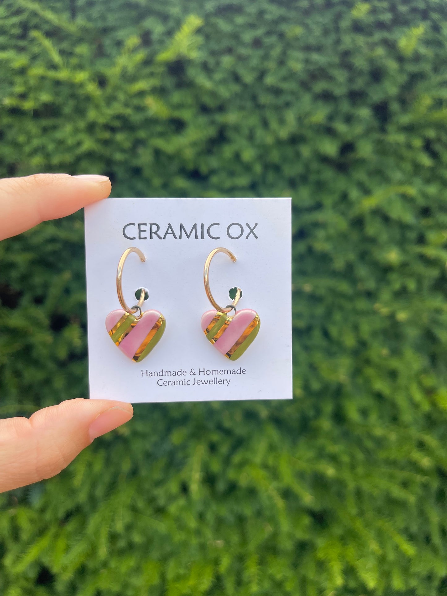Olive pink striped hearts on hoop studs