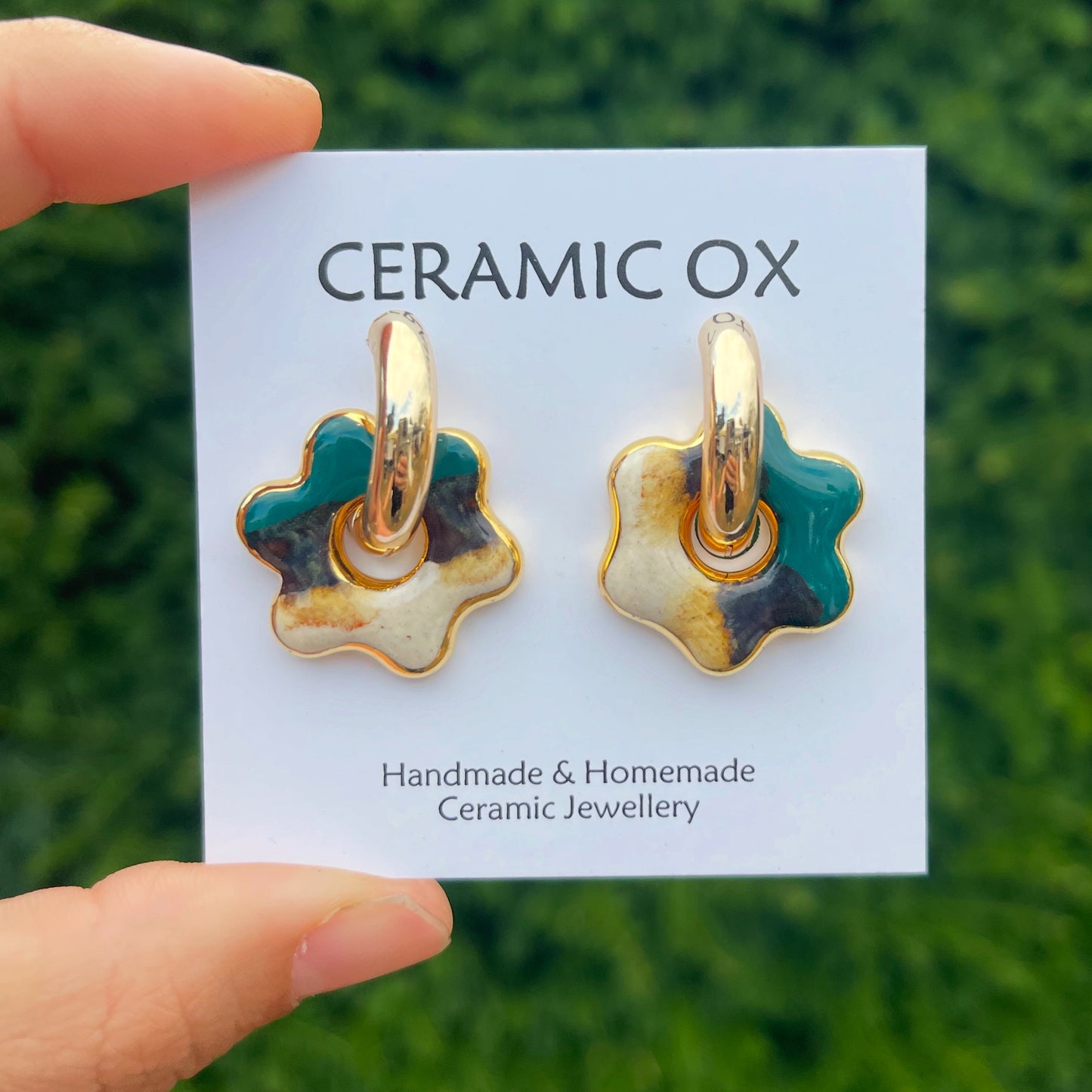 Flower charms on chunky hoops