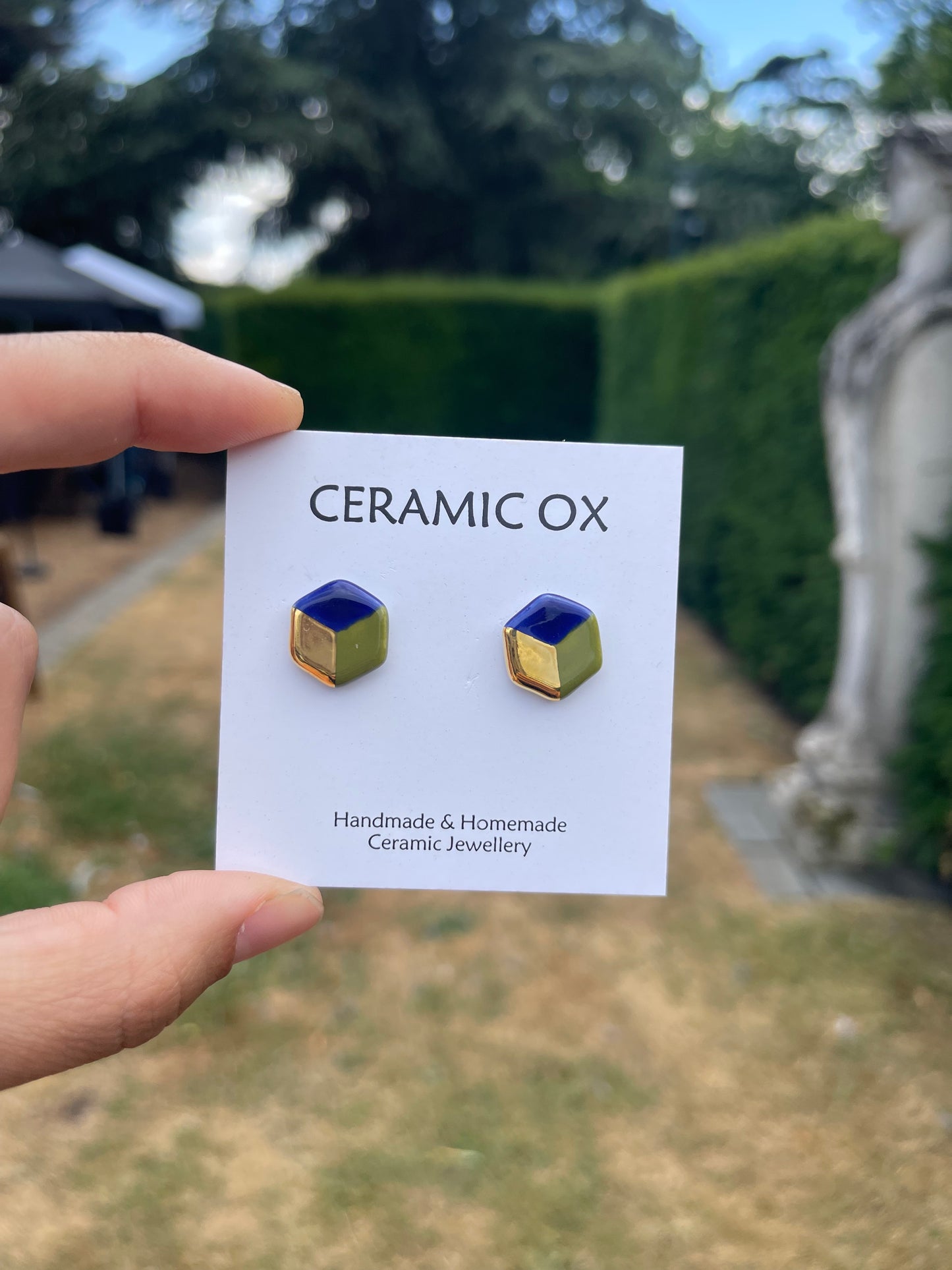 Small 3D hexagon studs in cobalt/olive/gold