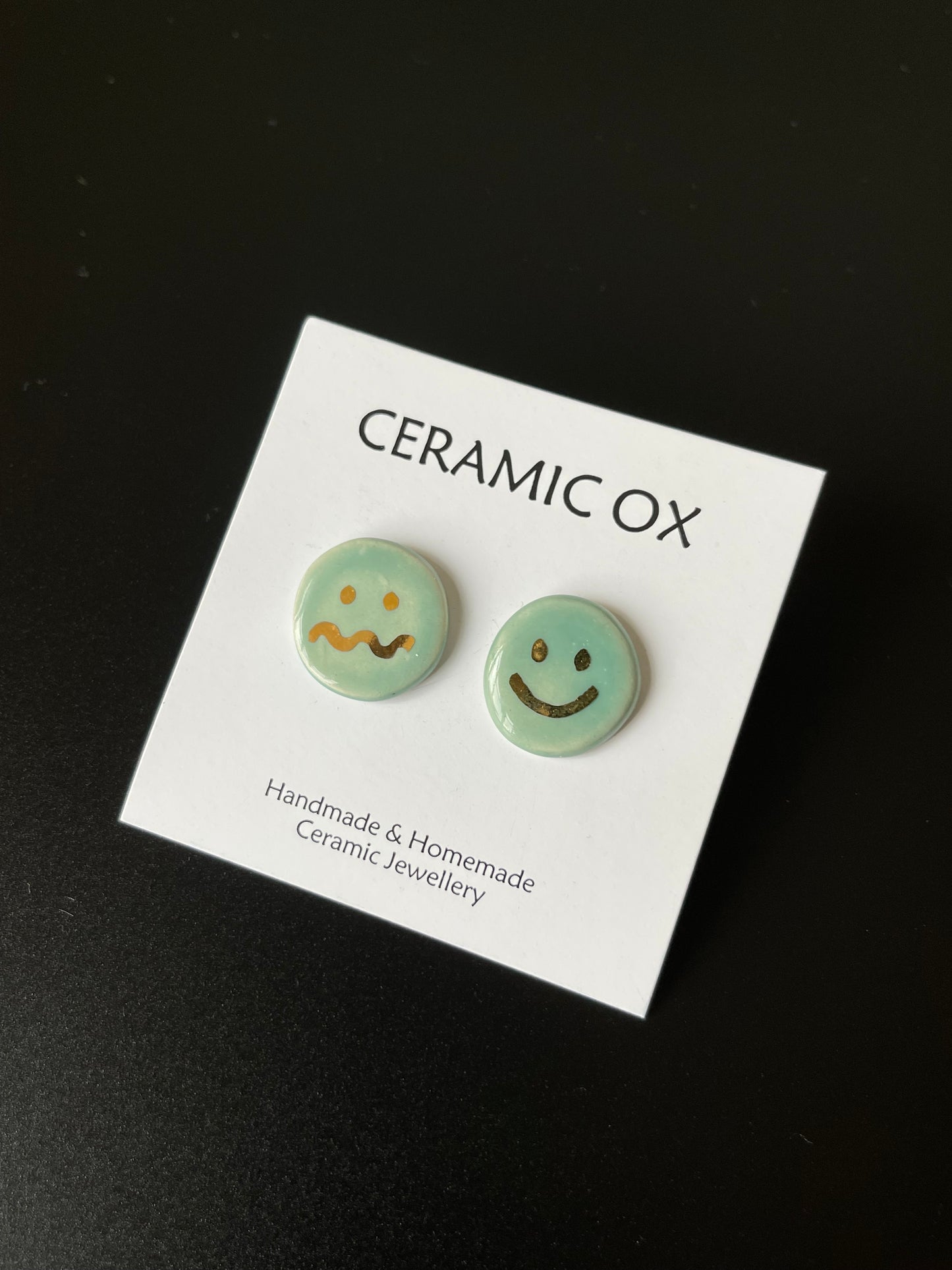 Smiley/squiggly face studs