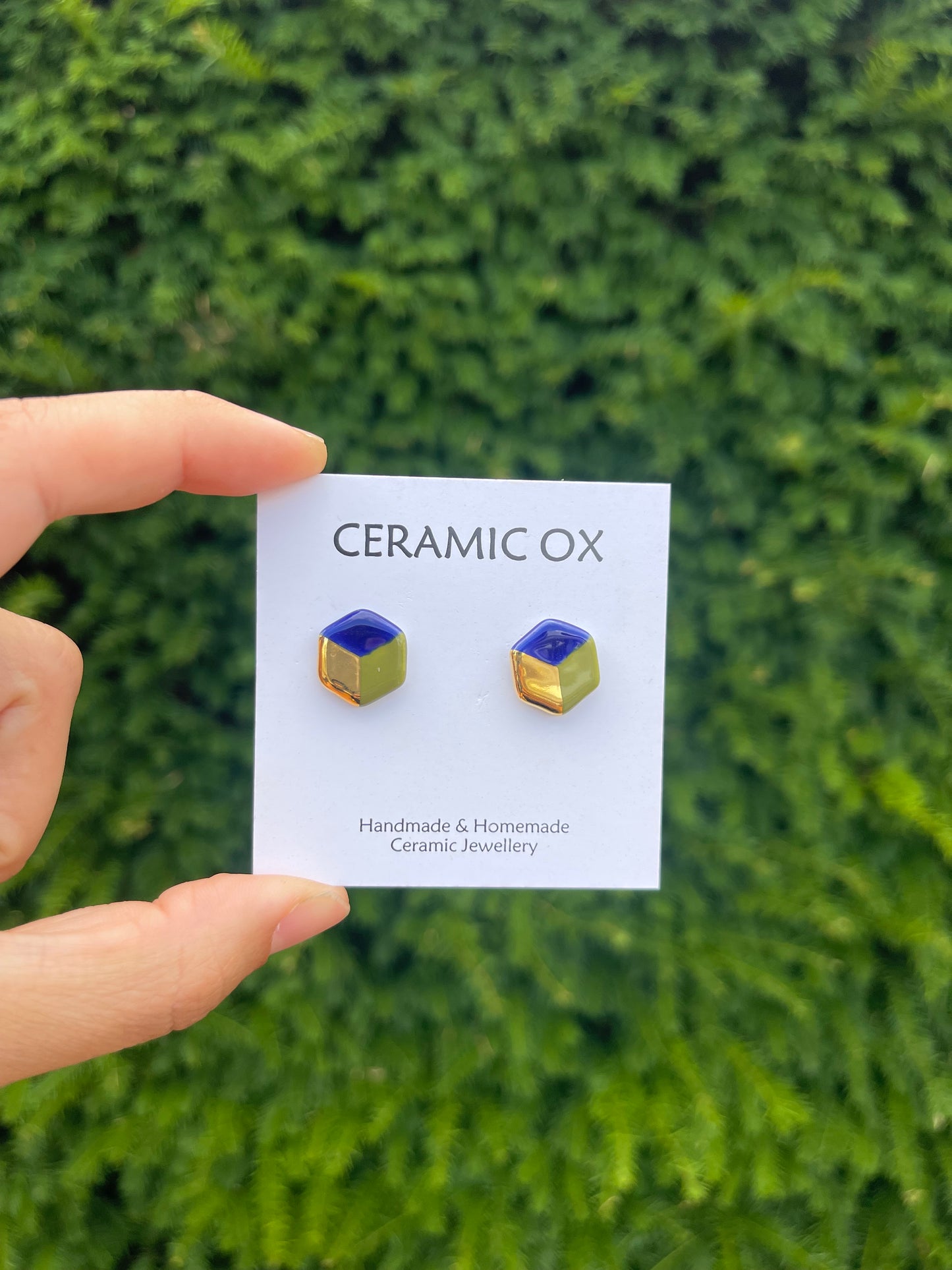 Small 3D hexagon studs in cobalt/olive/gold