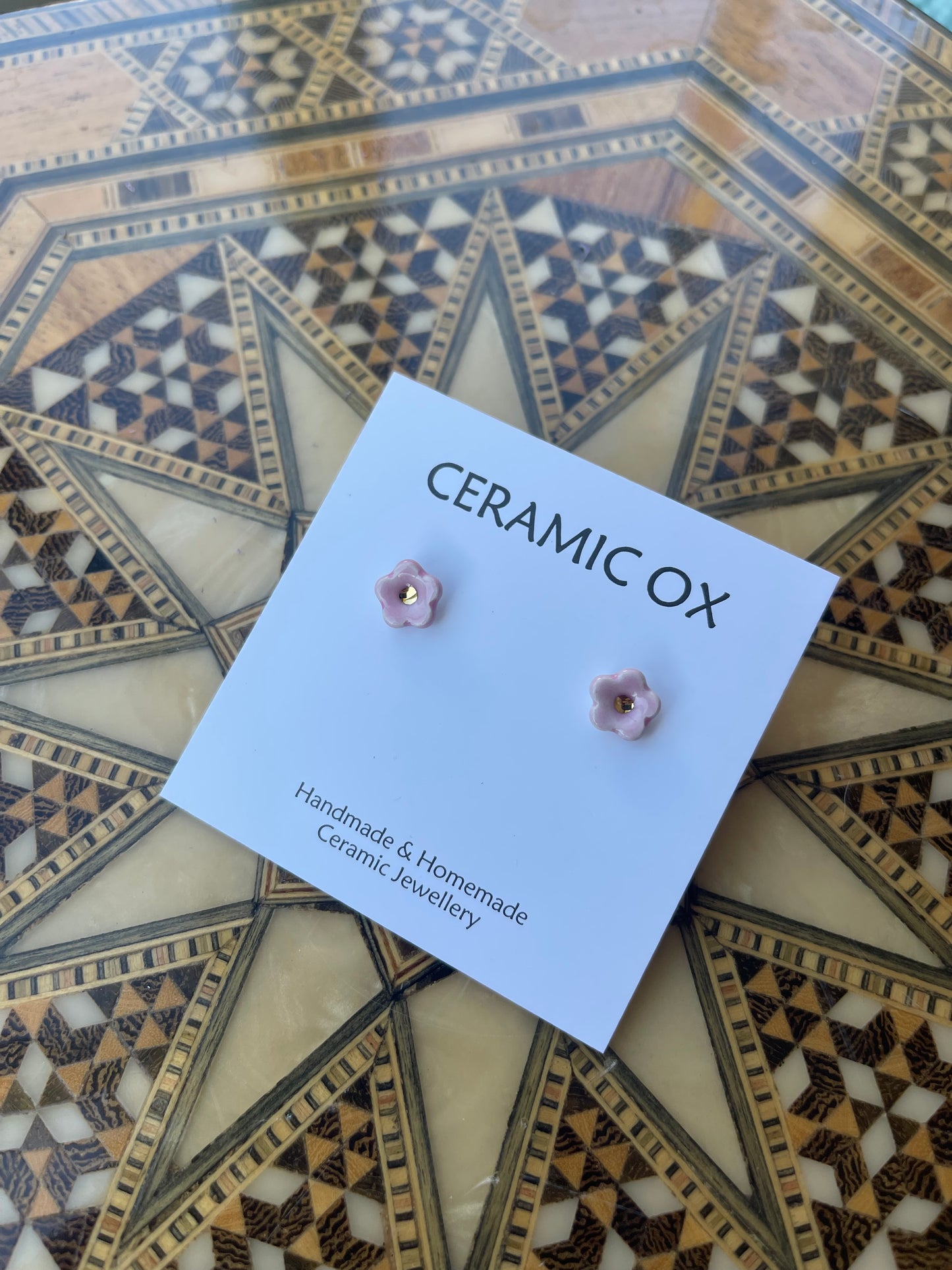 Pink tiny Daisy studs
