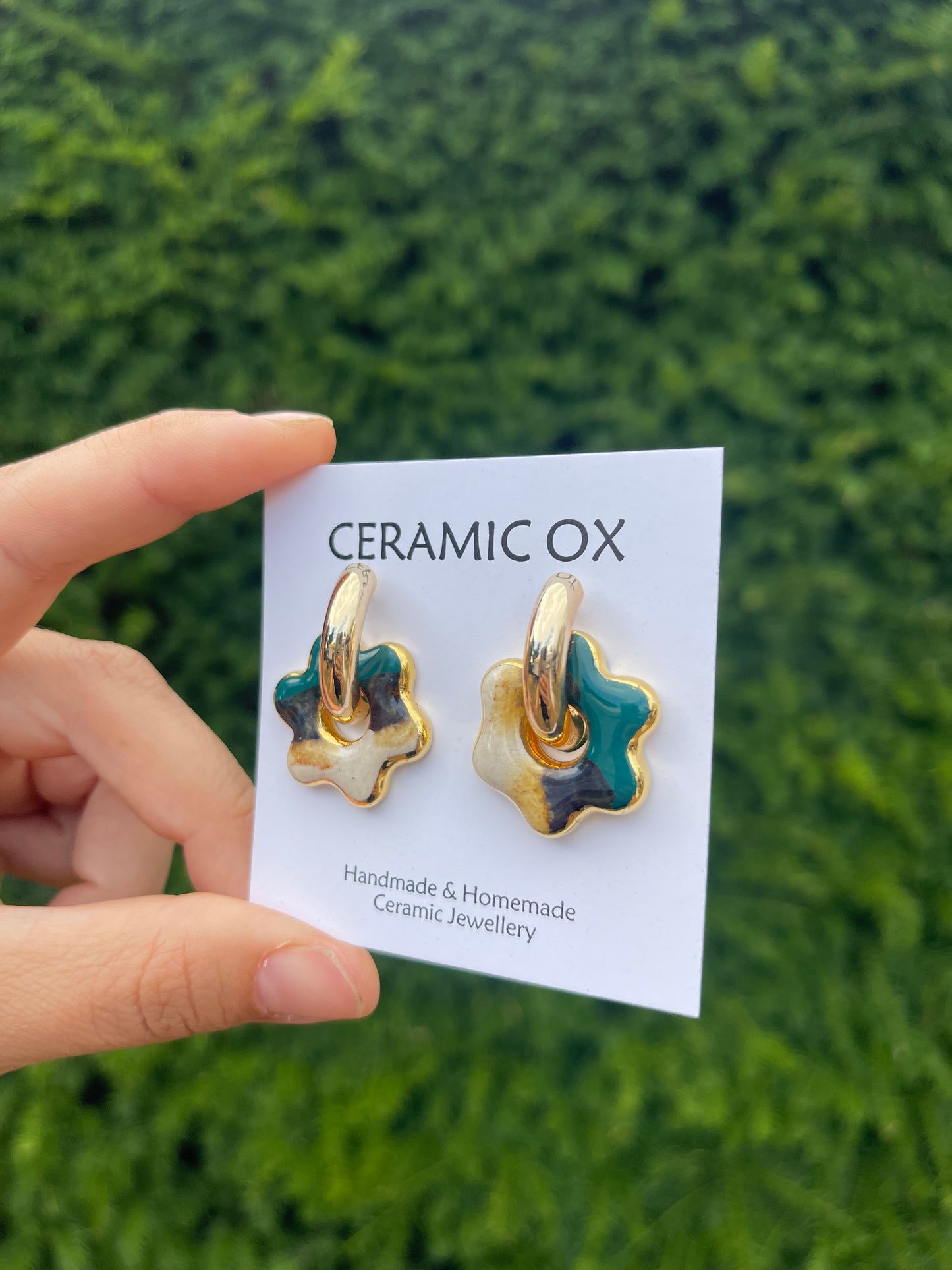 Flower charms on chunky hoops