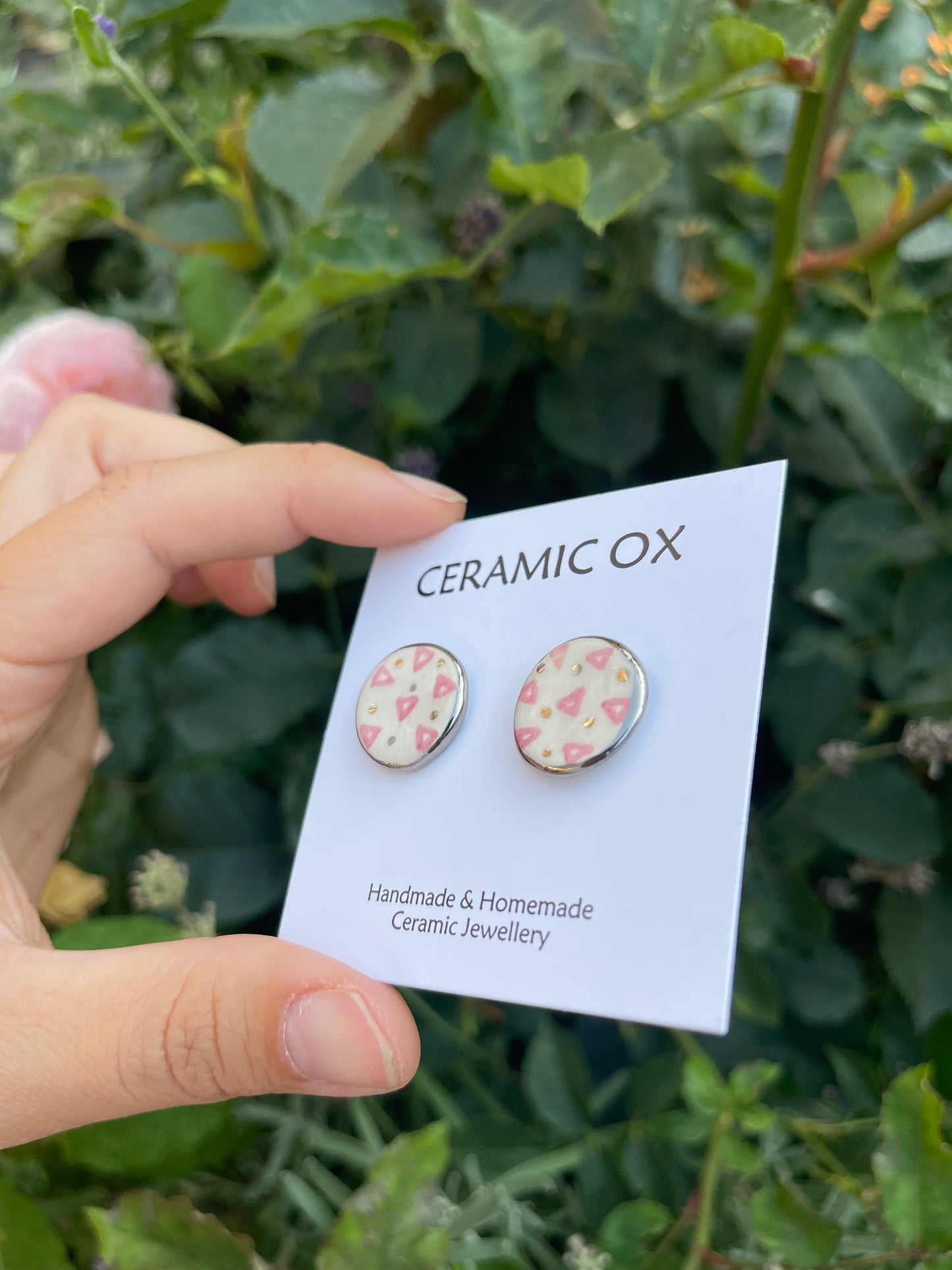 Pink triangle circle studs in silver