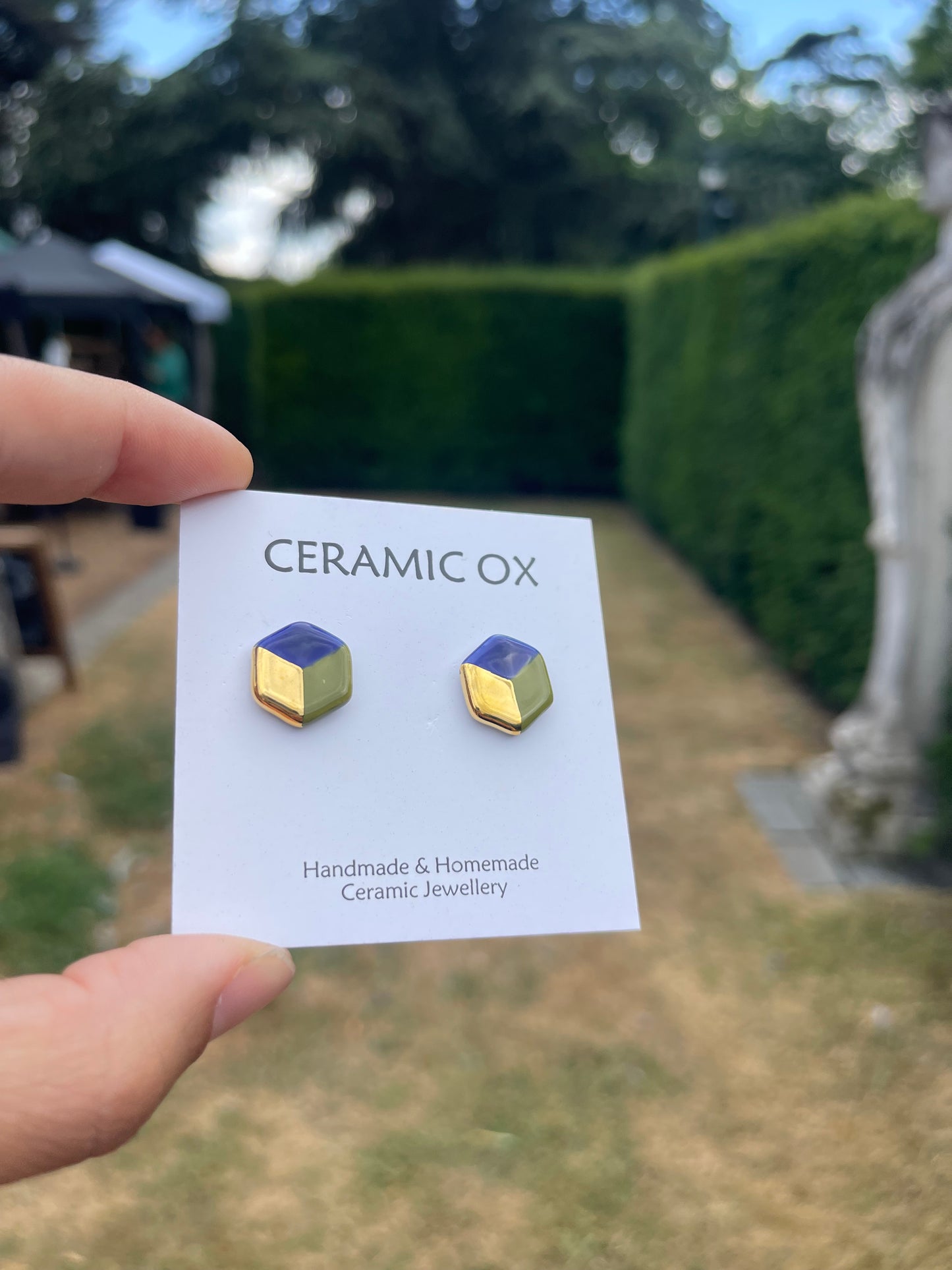 Small 3D hexagon studs in cobalt/olive/gold
