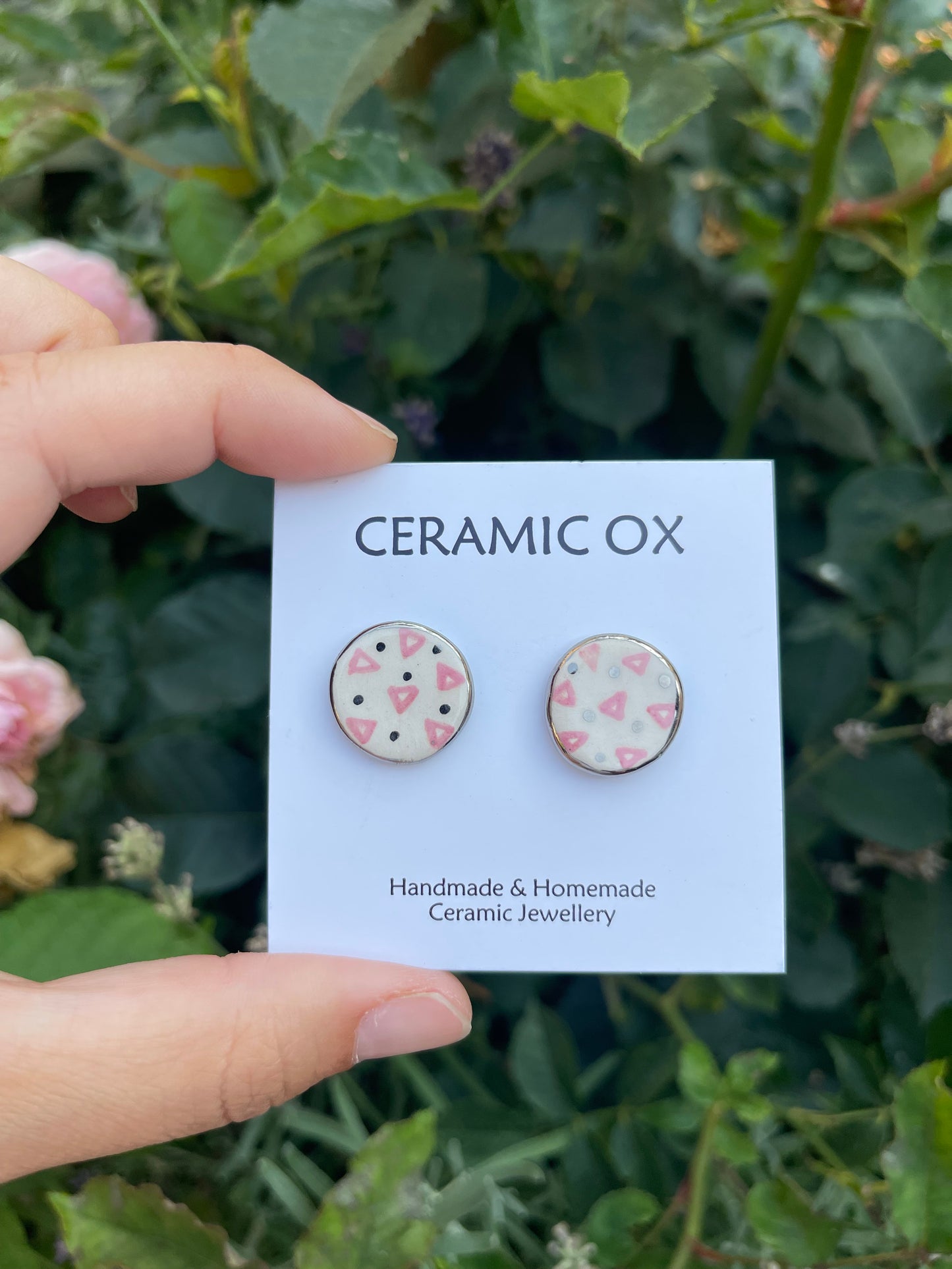 Pink triangle circle studs in silver