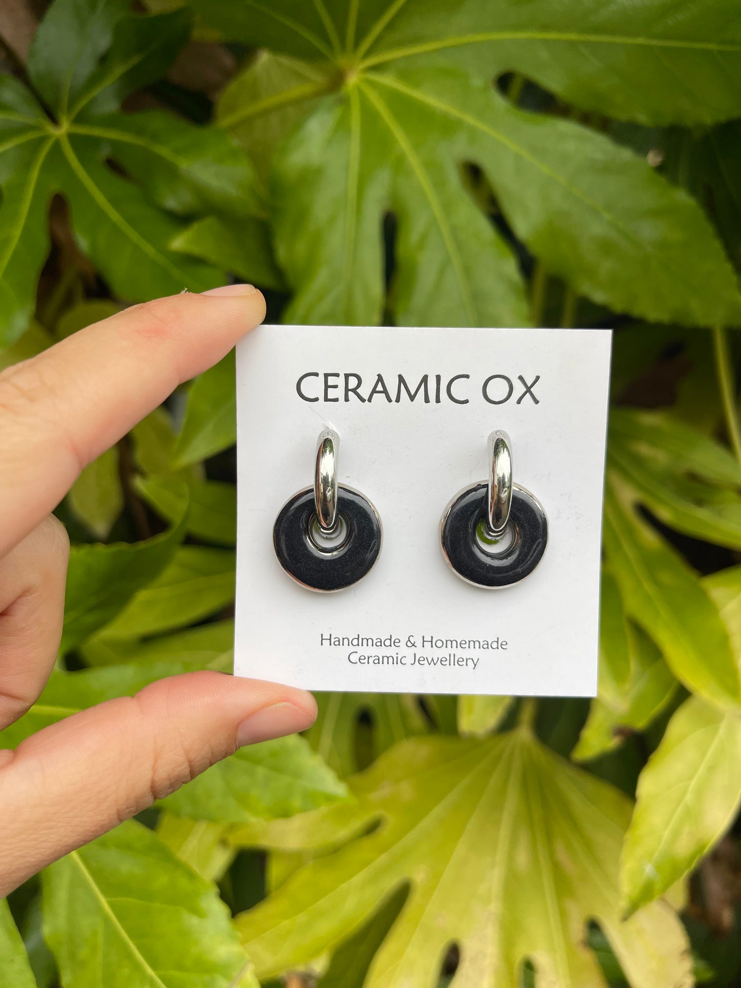 Black with silver on chunky hoops