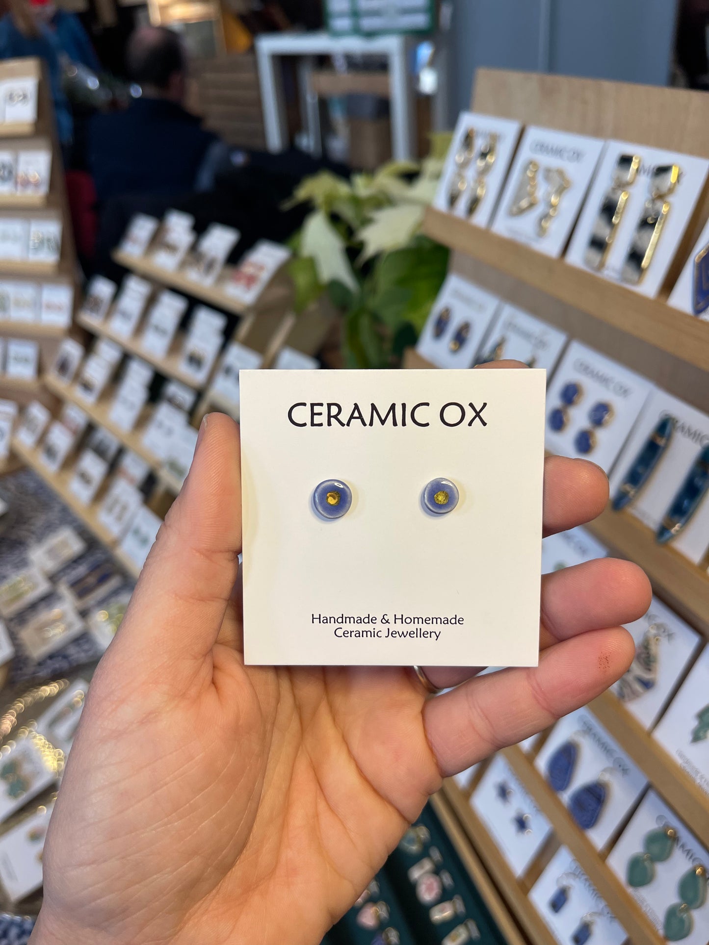 Tiny gold dot studs