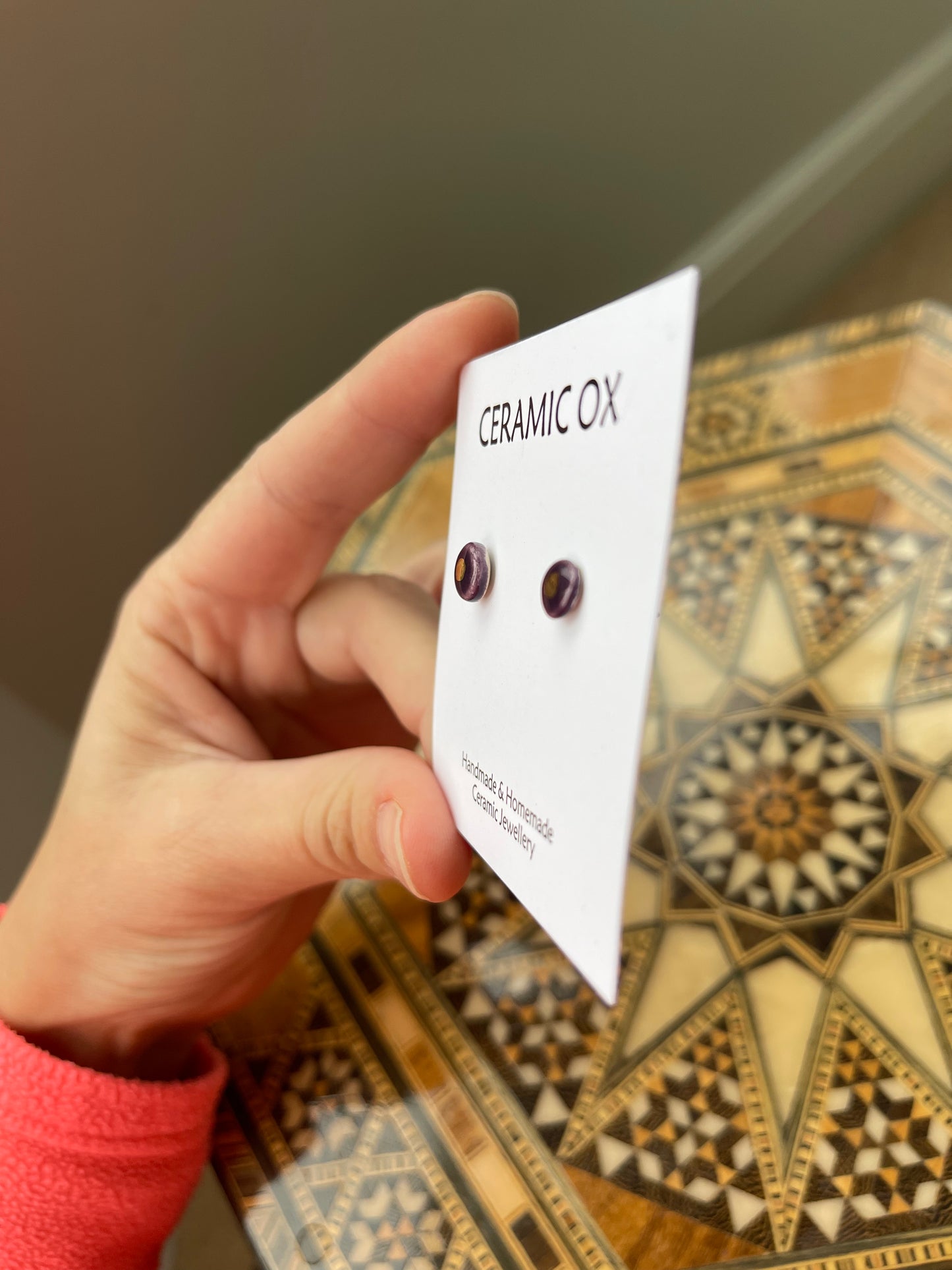 Tiny gold dot studs