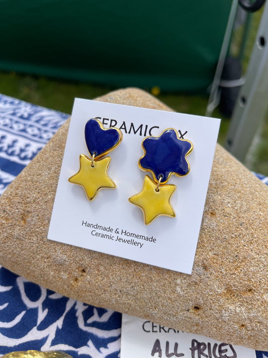 Mismatched cobalt/yellow dangle studs
