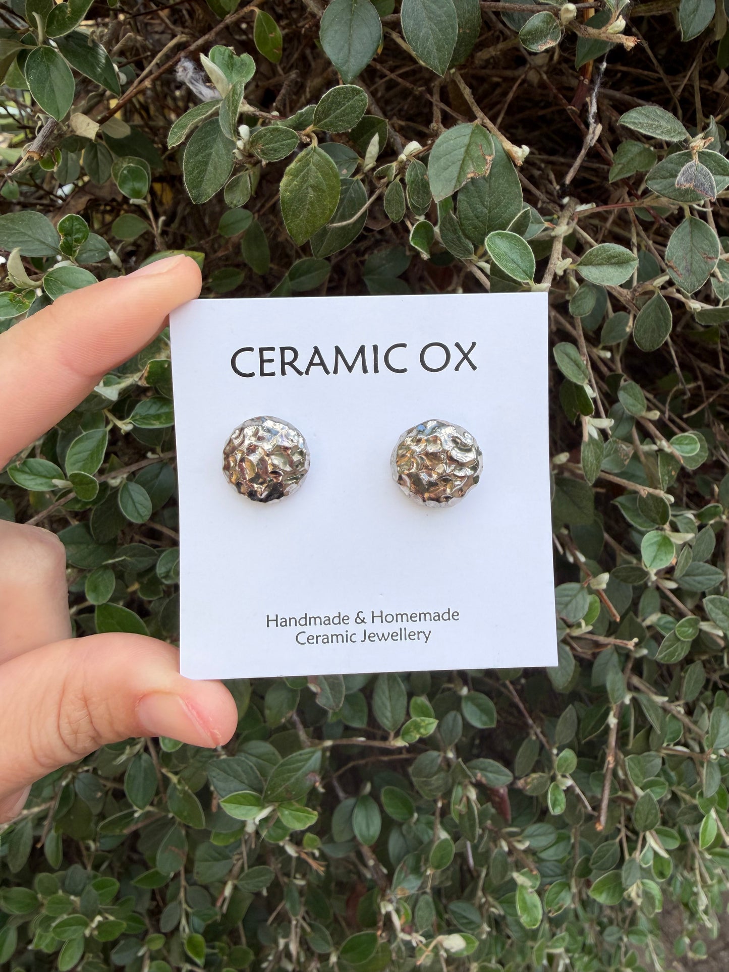Textured round studs in silver