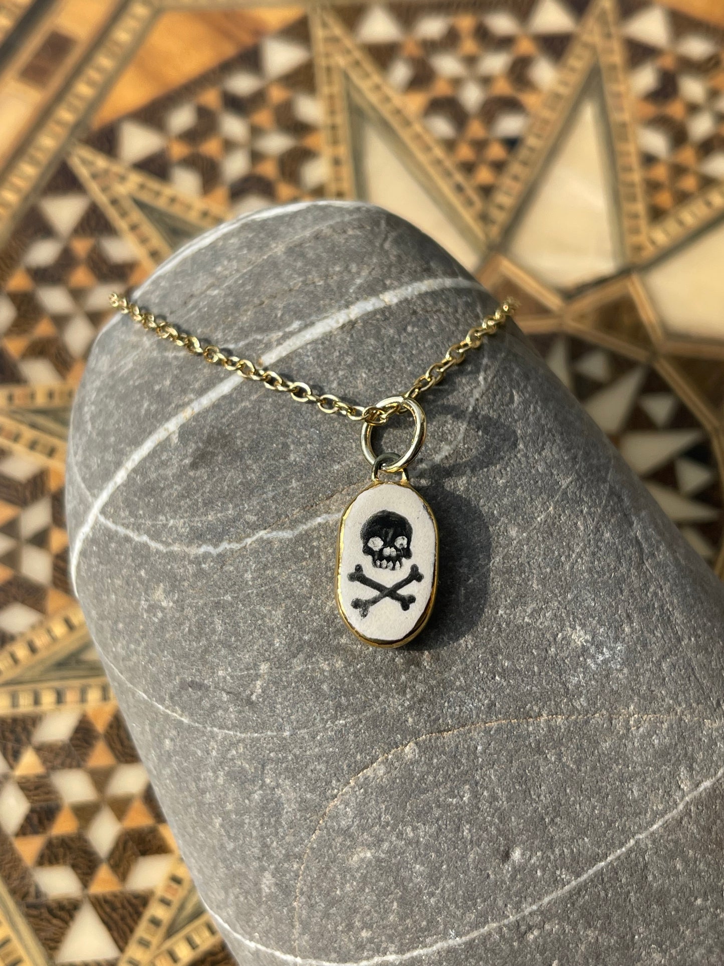 Skull & cross bones charm