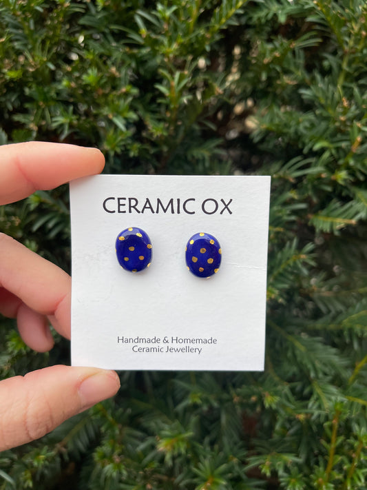 Cobalt oval rounded studs with gold dots