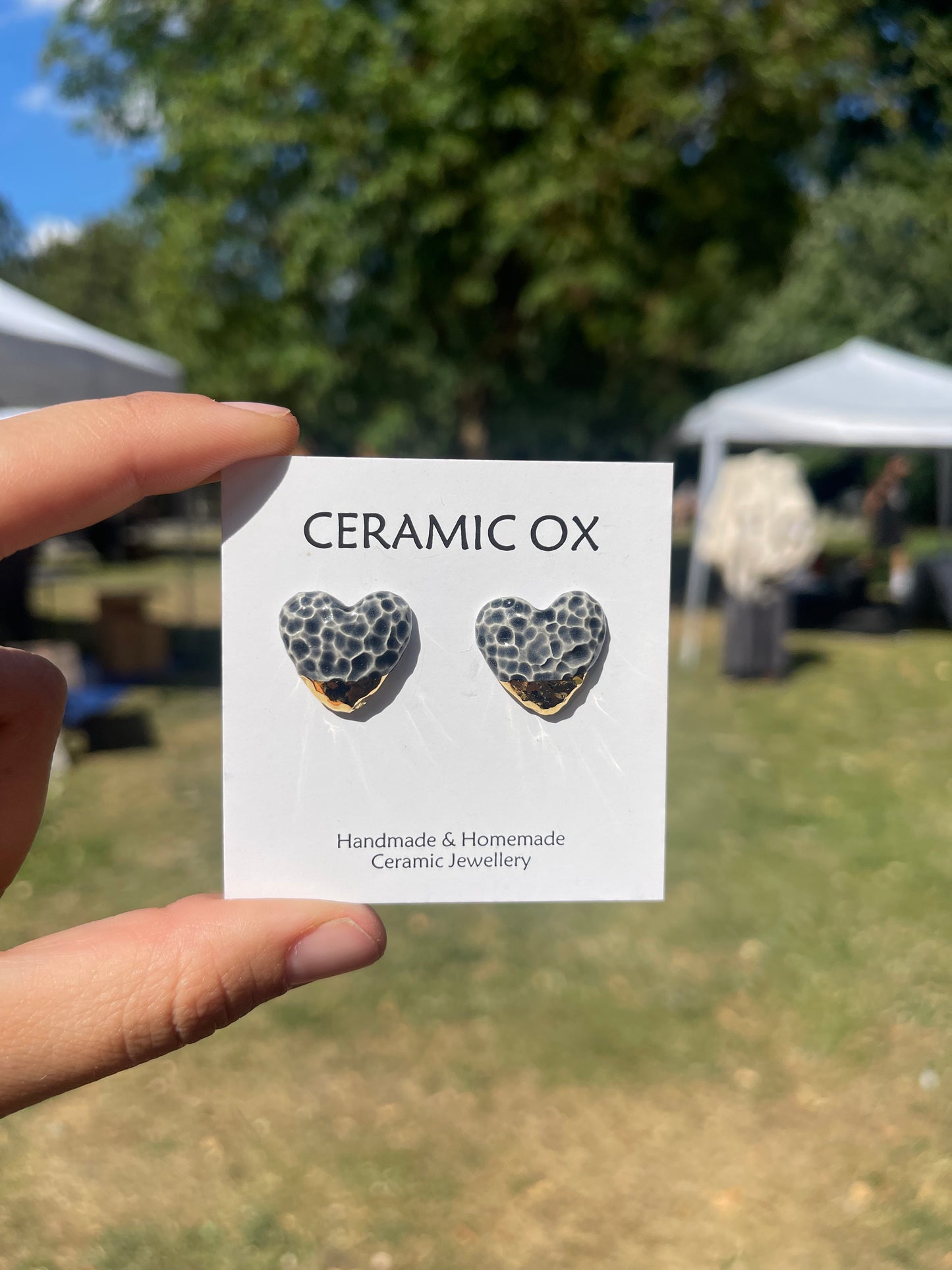 Textured convex heart shaped, gold dipped in grey/black