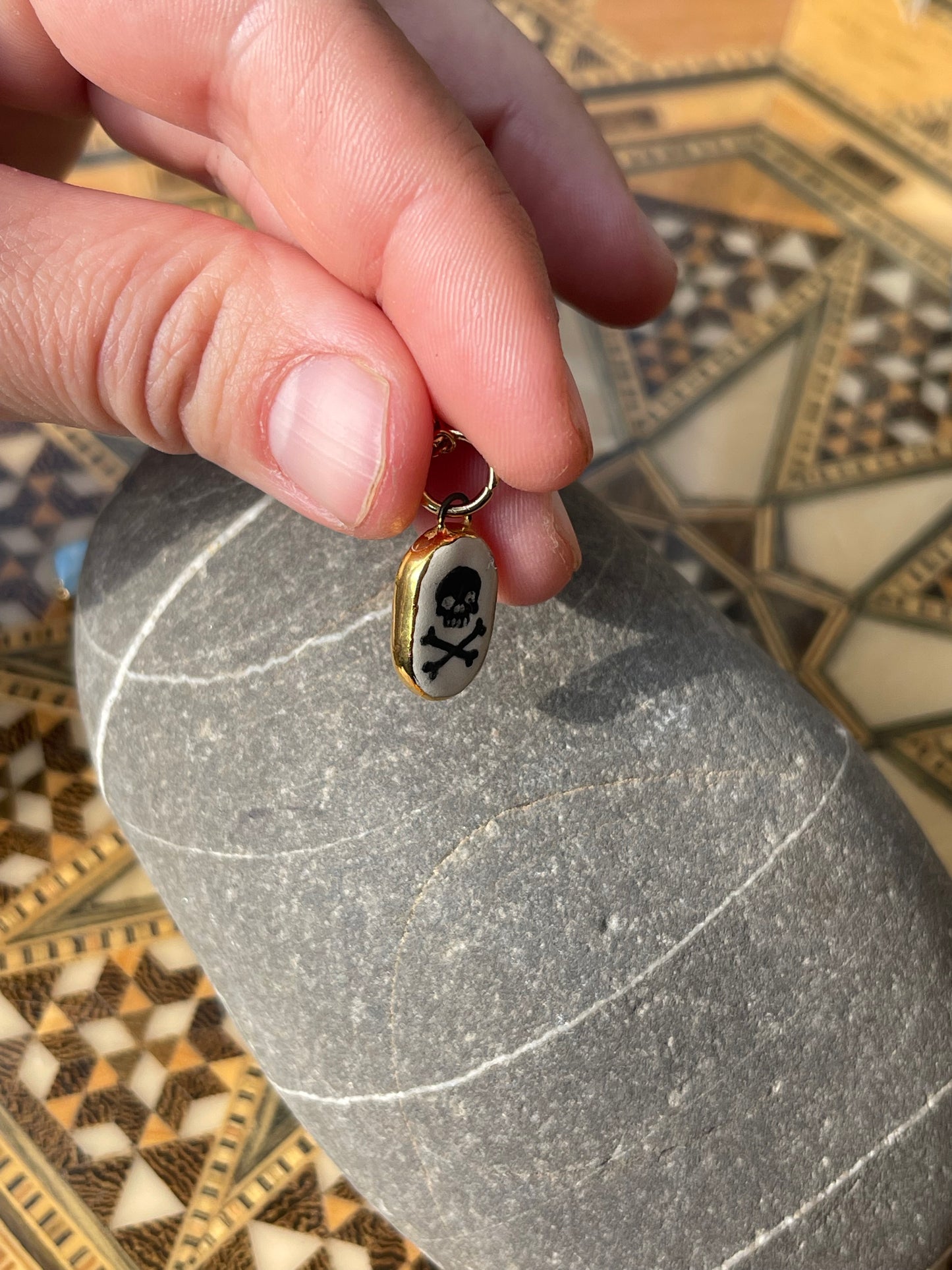 Skull & cross bones charm