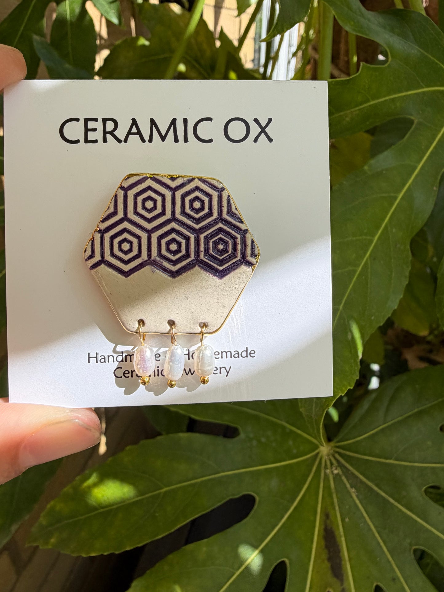 Hexagon brooch with dark purple and freshwater pearls