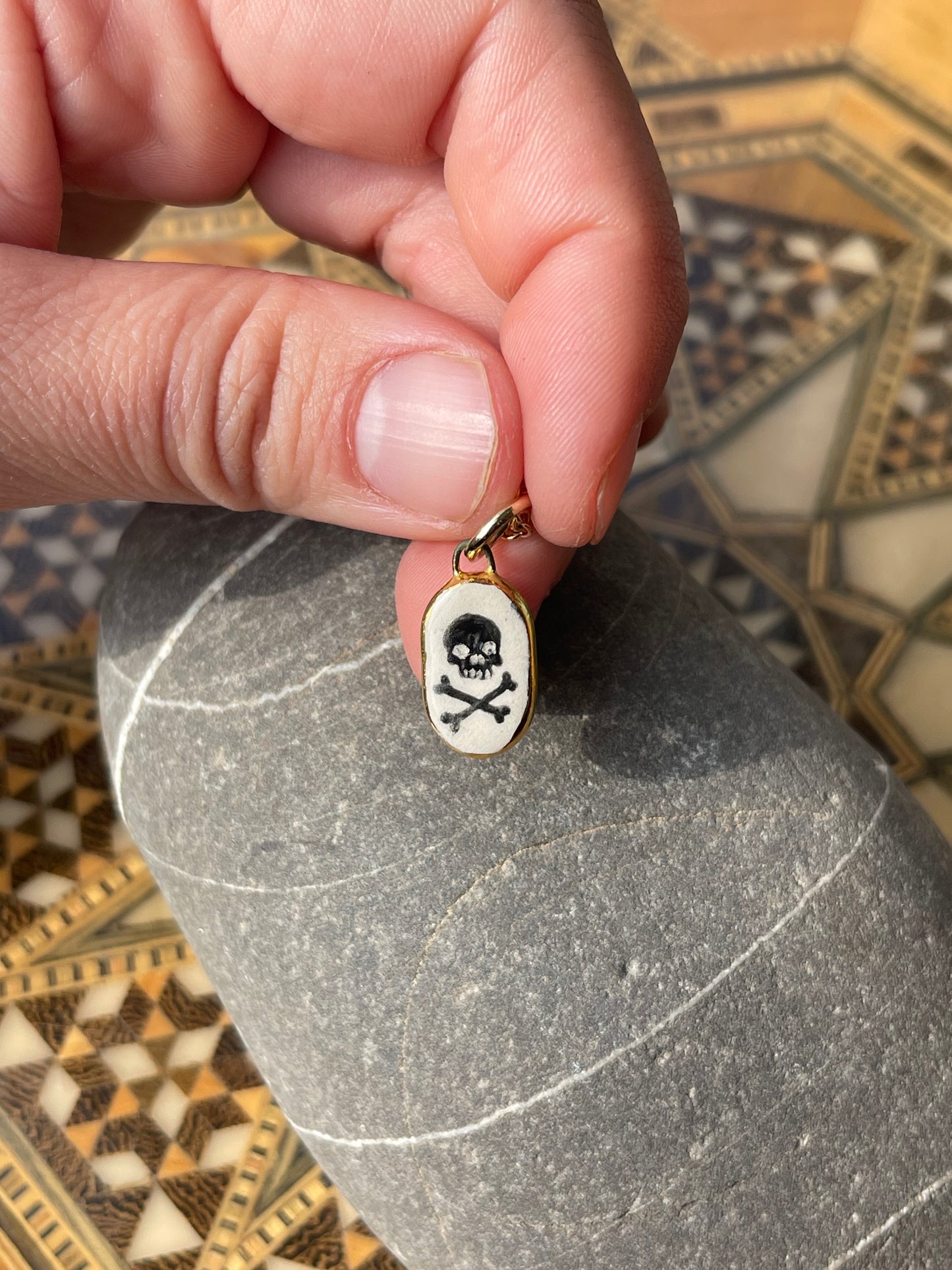 Skull & cross bones charm