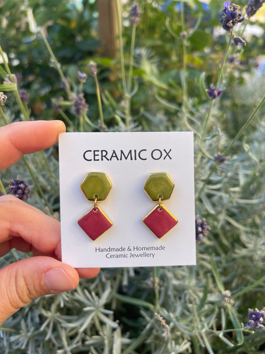 Raspberry Olive geometric dangle studs.