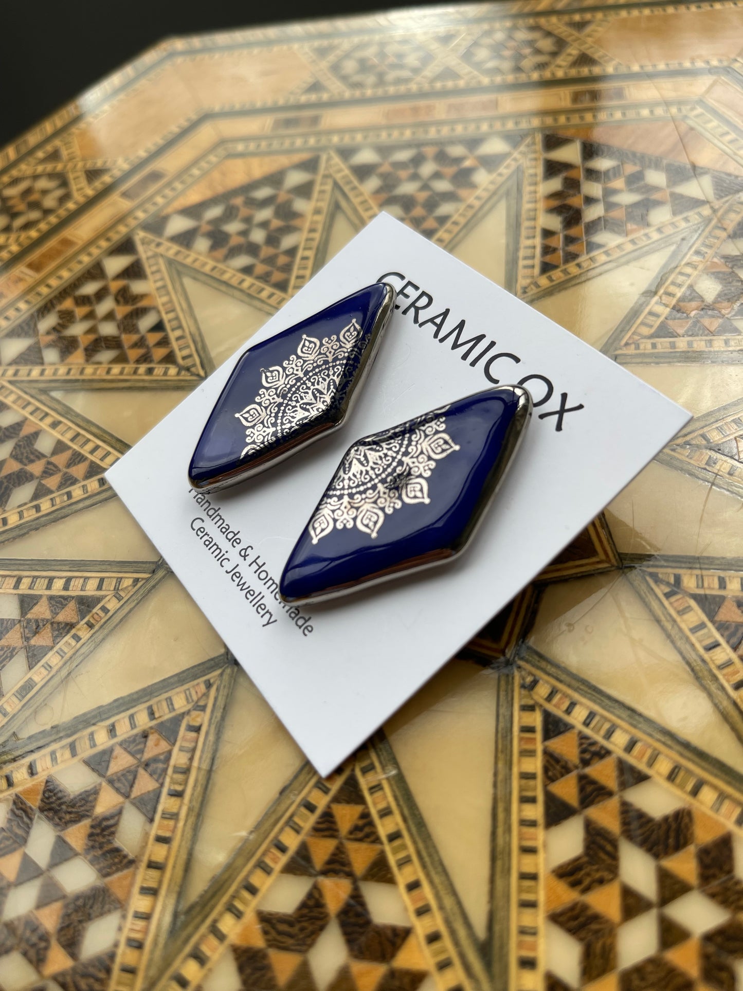 Large diamond cobalt filigree style over glaze