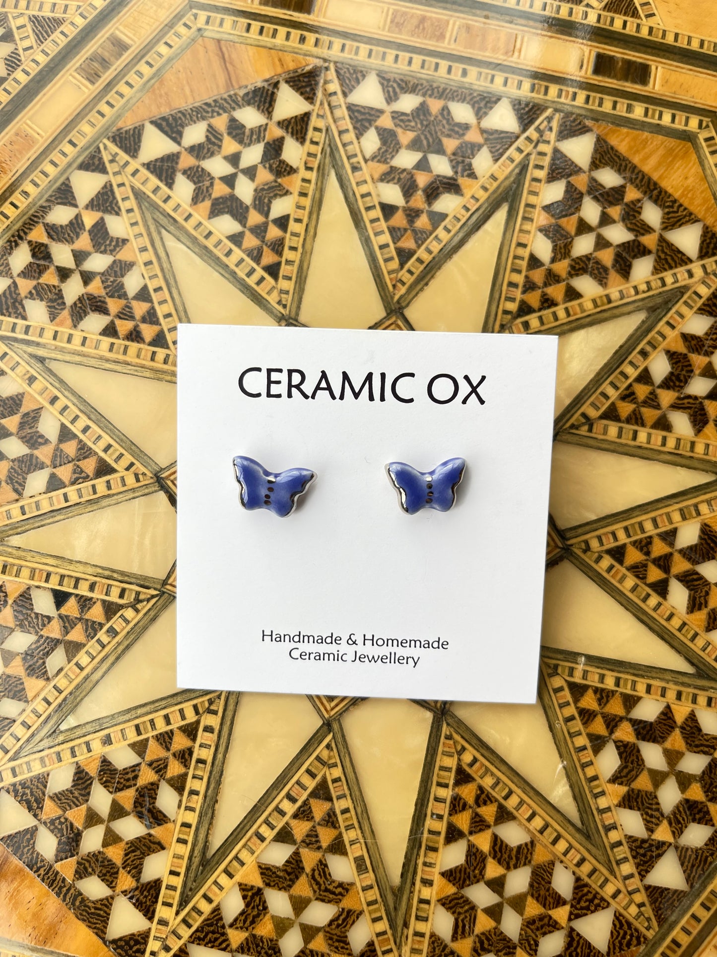 Platinum silver edged mini butterflies