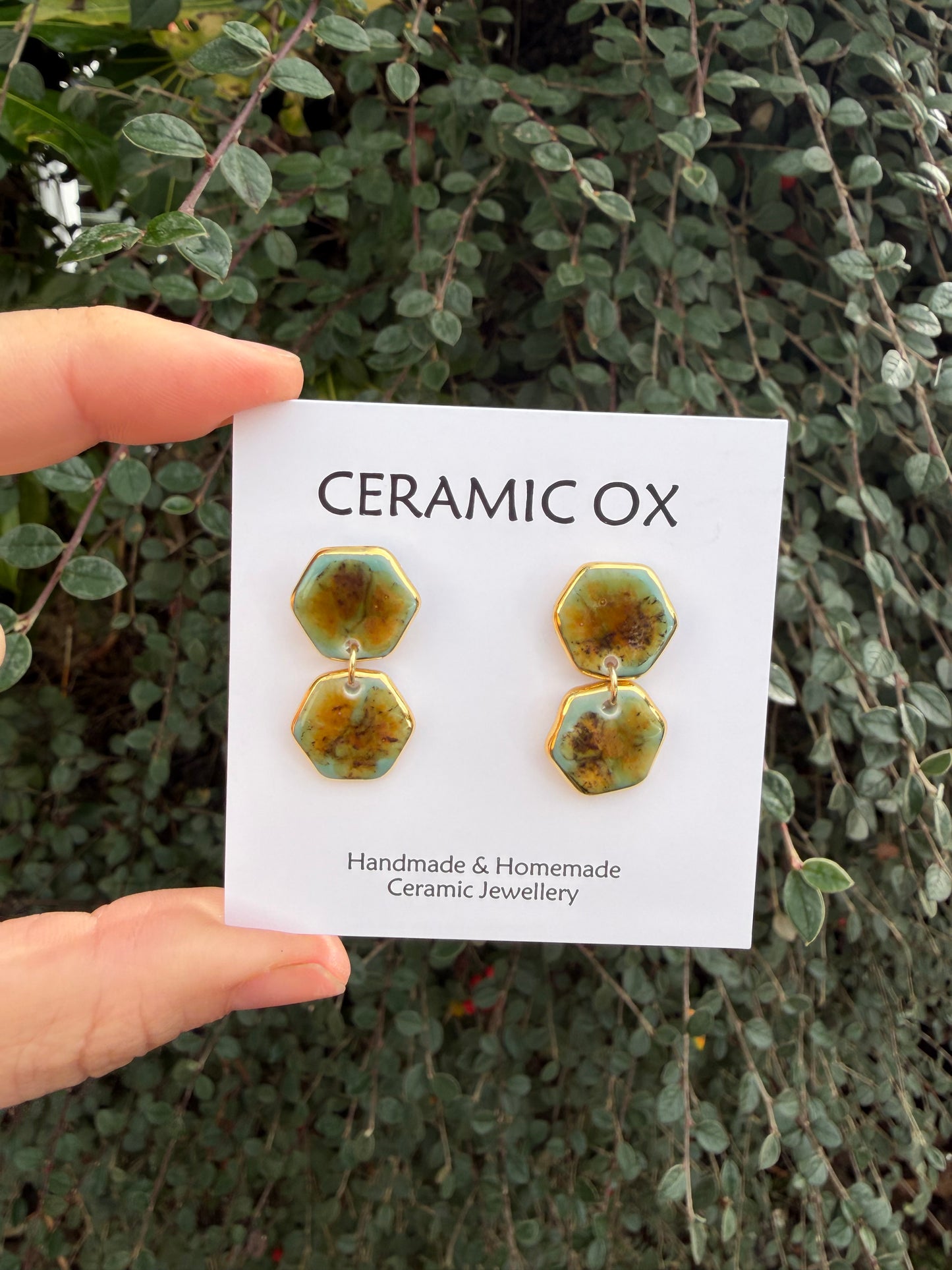 Double hexagons dangly drops in tiger jade