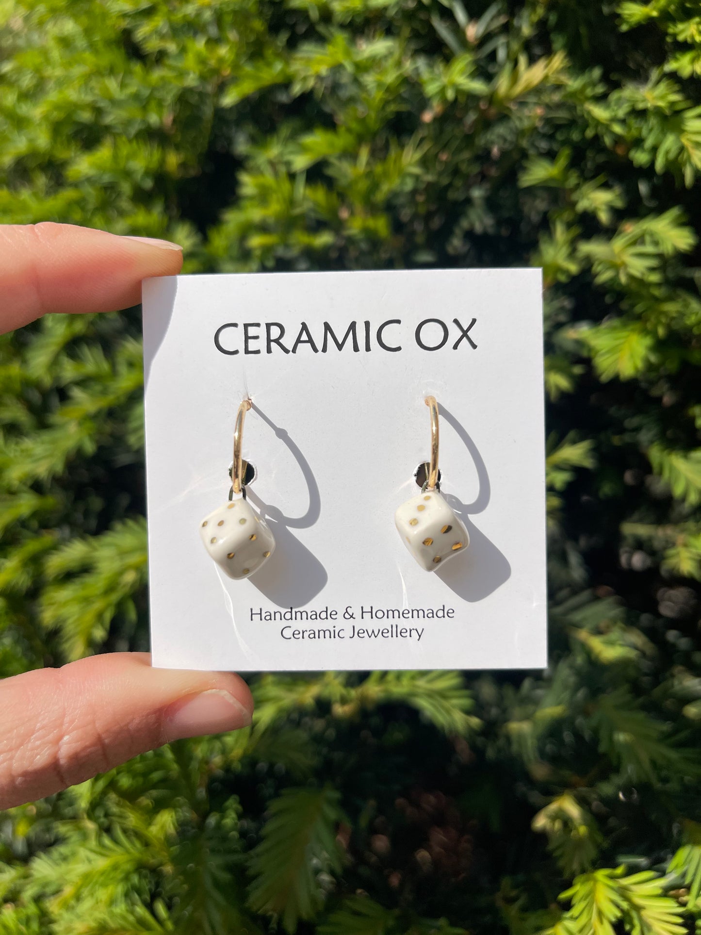 White dice on hoops