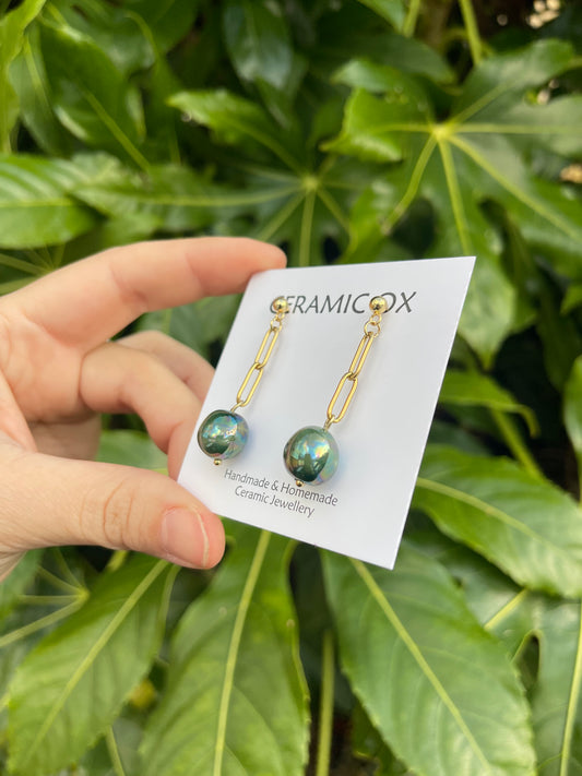 Green iridescent bead drops