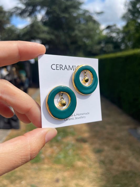 Teal studs with ceramic dangle