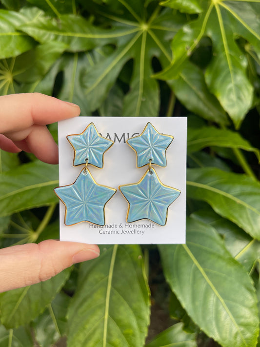 Double iridescent star dangle studs