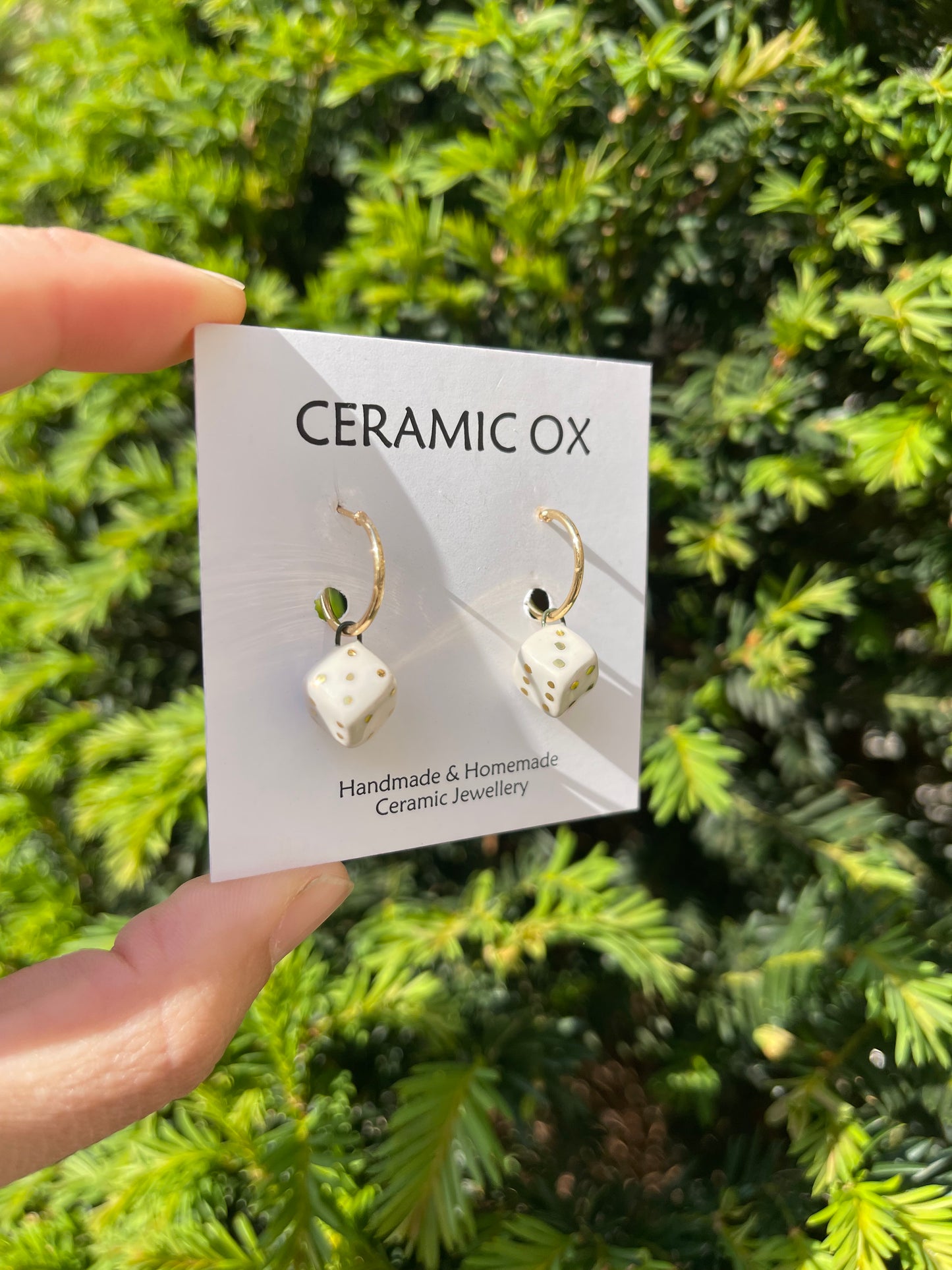 White dice on hoops