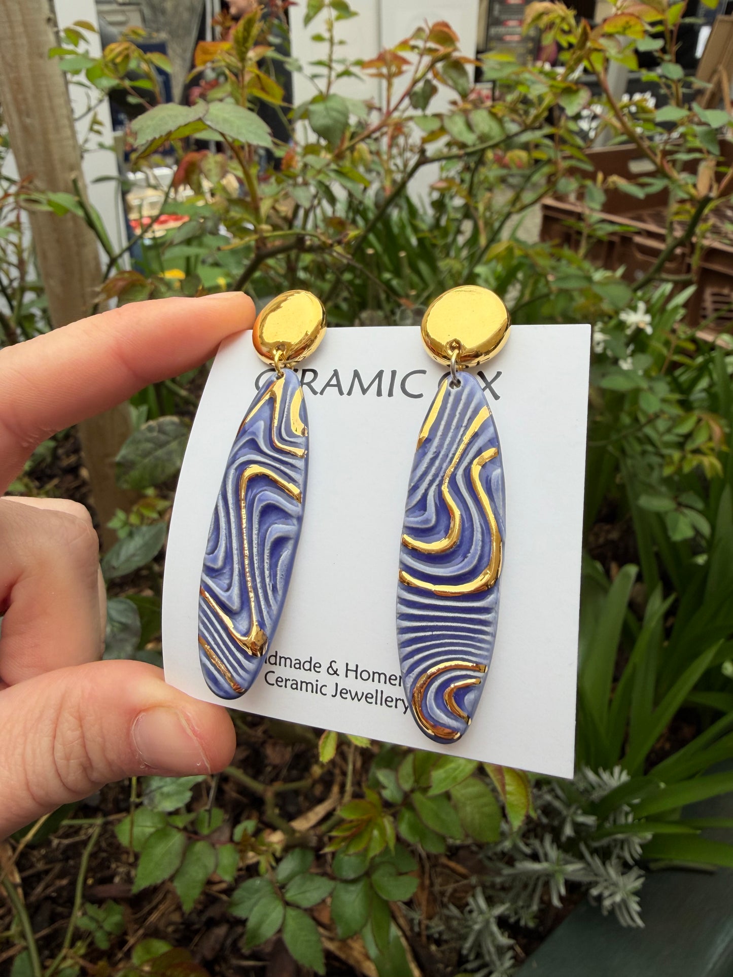 Fingerprint dangle studs