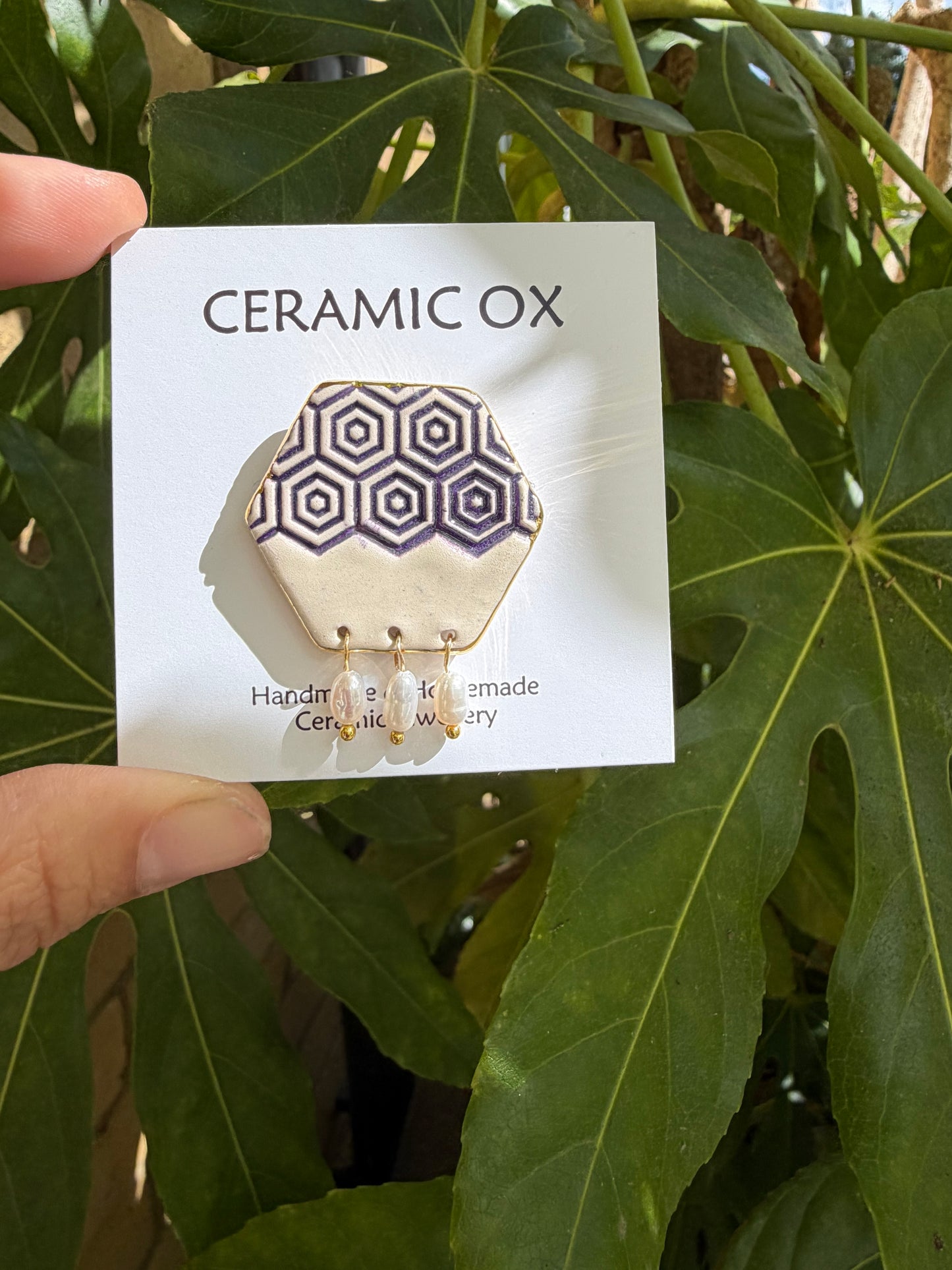 Hexagon brooch with dark purple and freshwater pearls