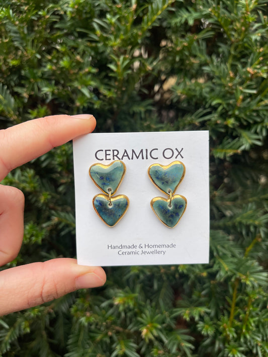 Double heart dangle stud in ‘storm’