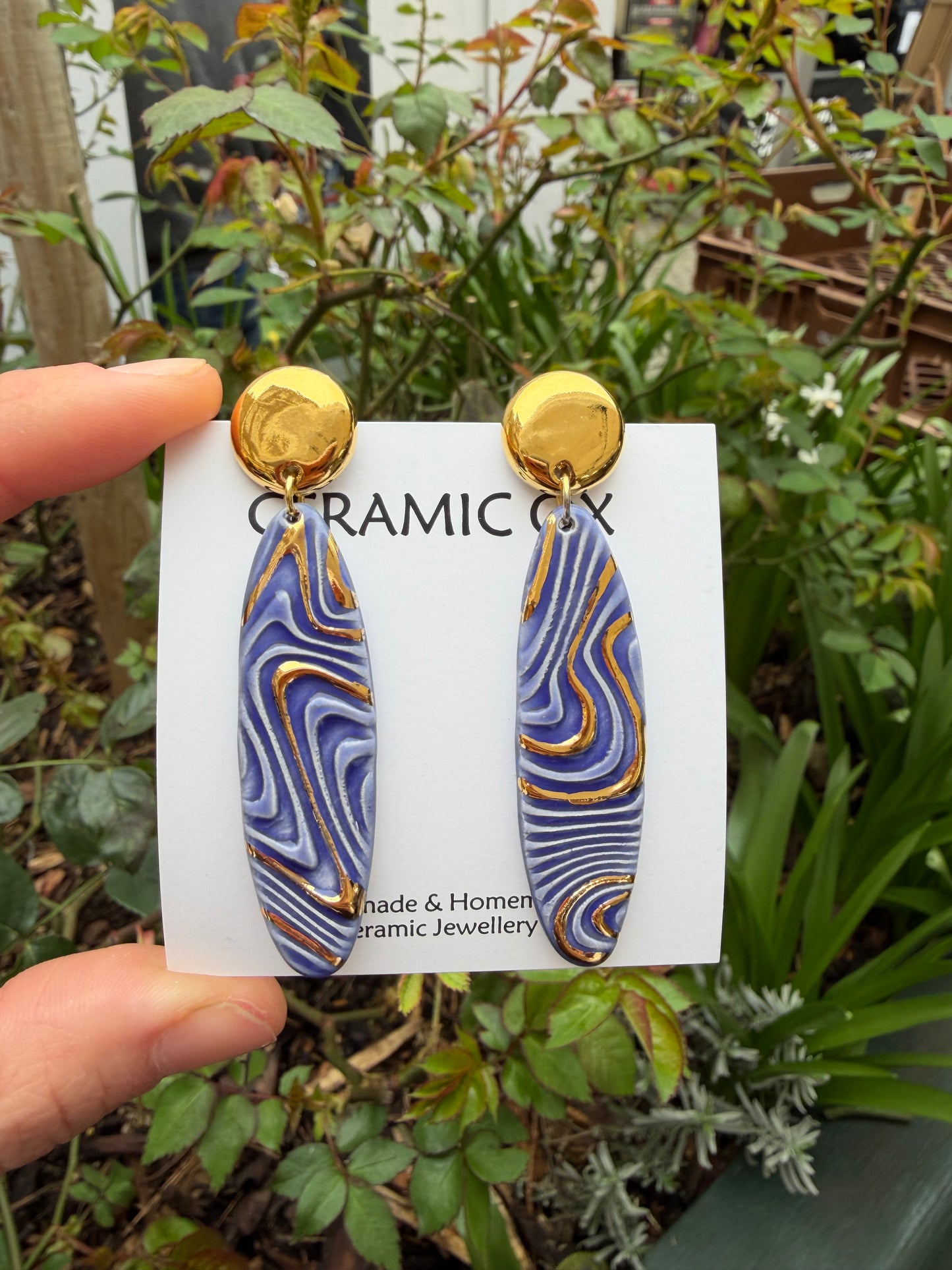 Fingerprint dangle studs