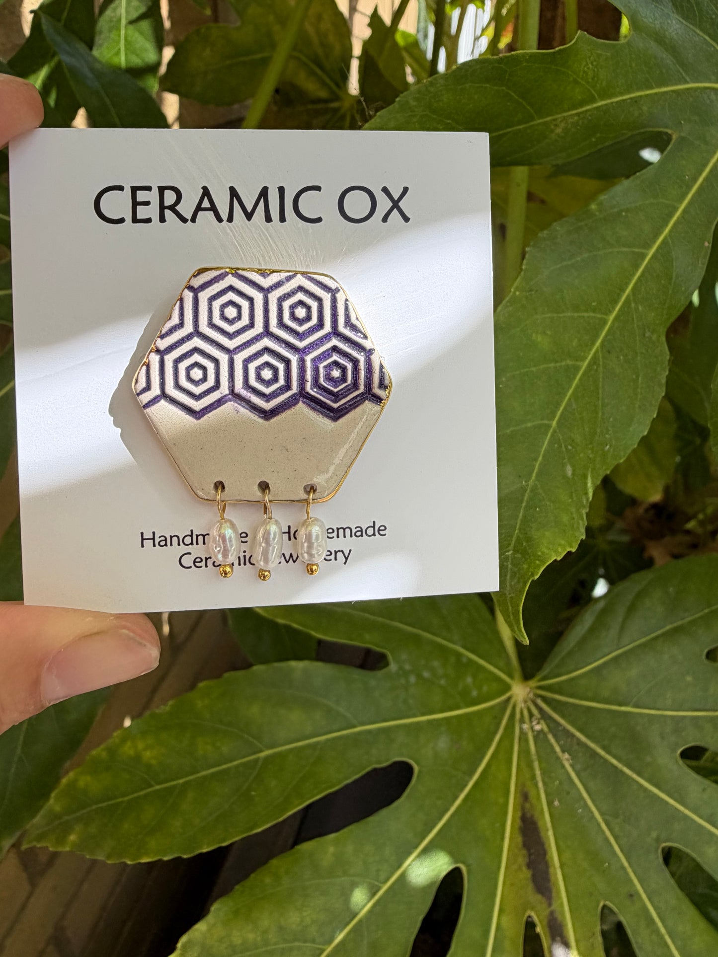 Hexagon brooch with dark purple and freshwater pearls