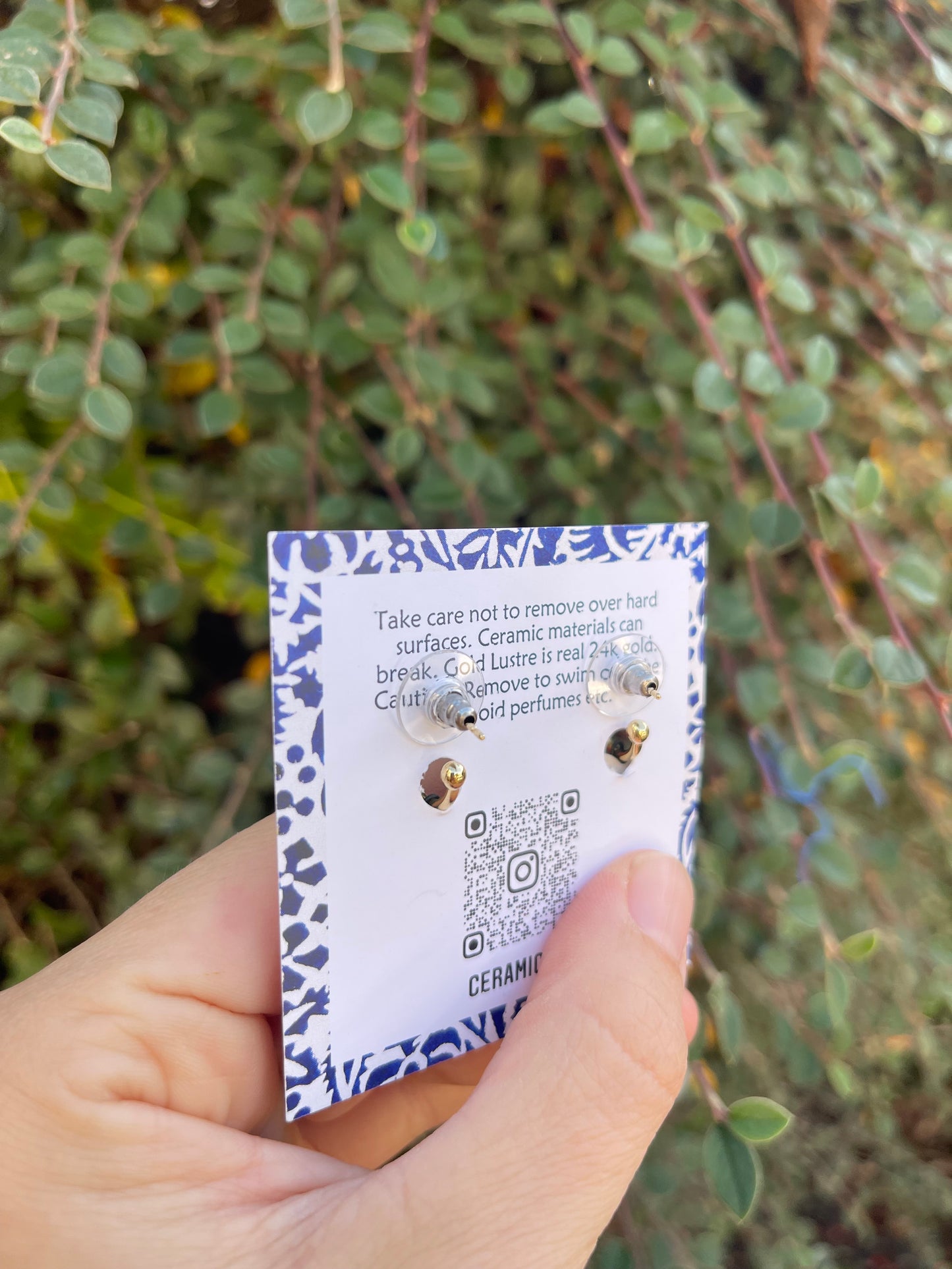 Heart danglies on hoop studs in Storm