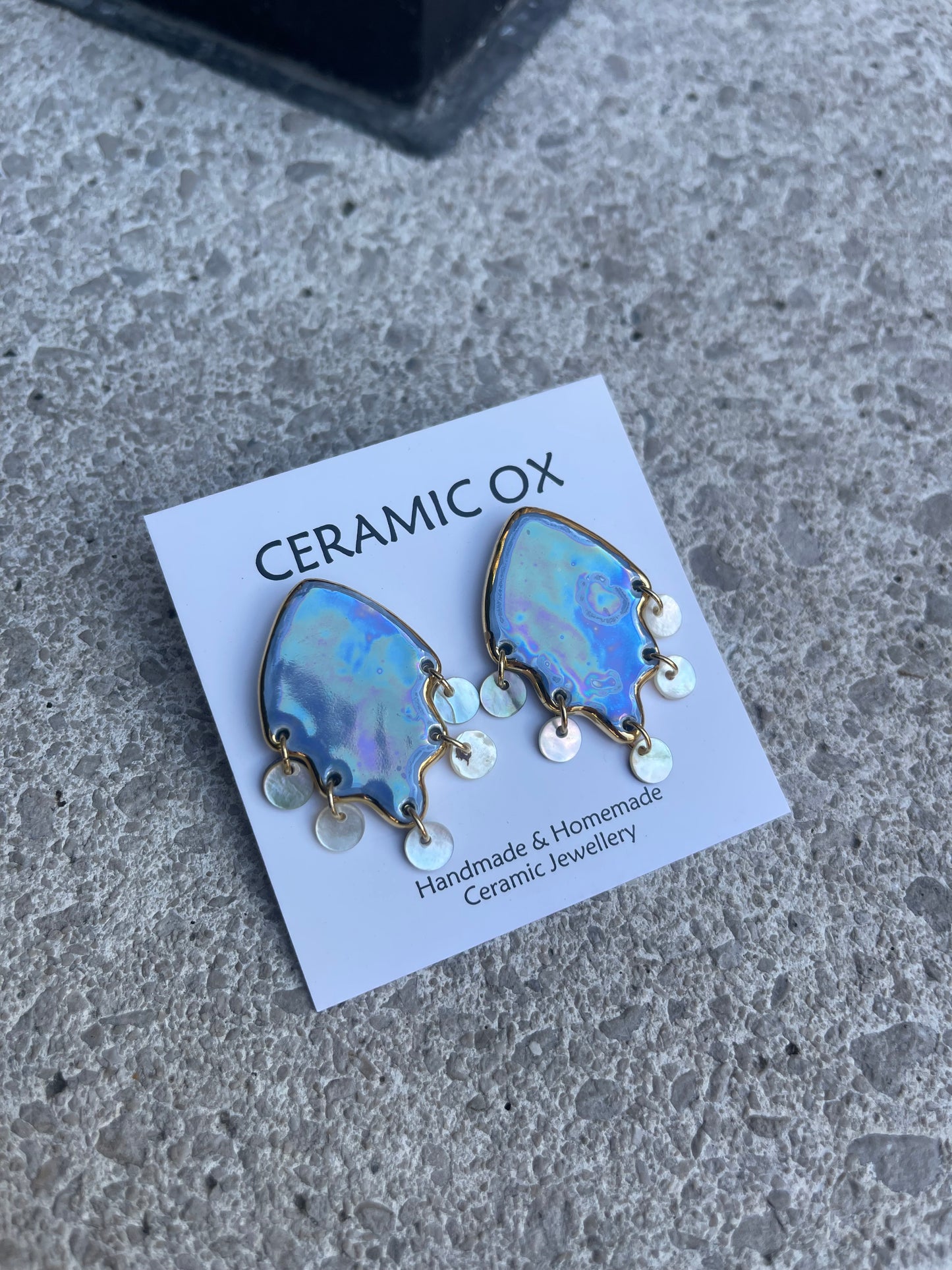 Mother of pearl studs with mother of pearl dangly discs