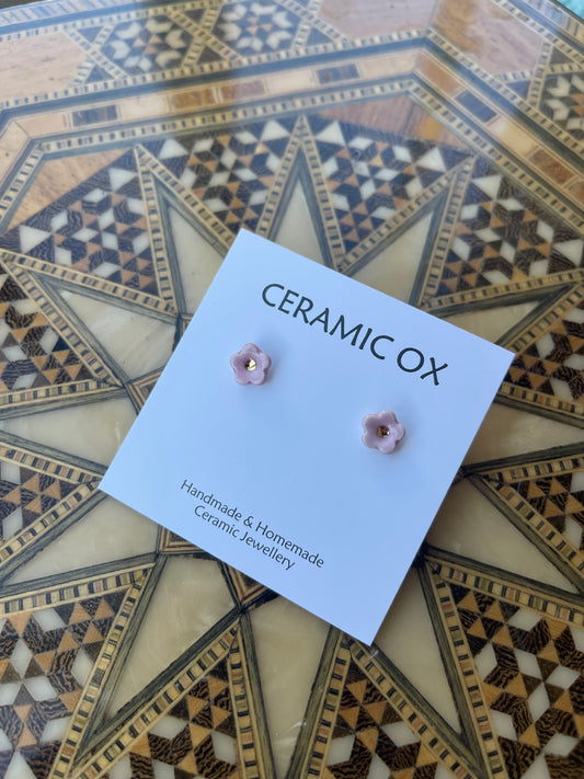Pink tiny Daisy studs