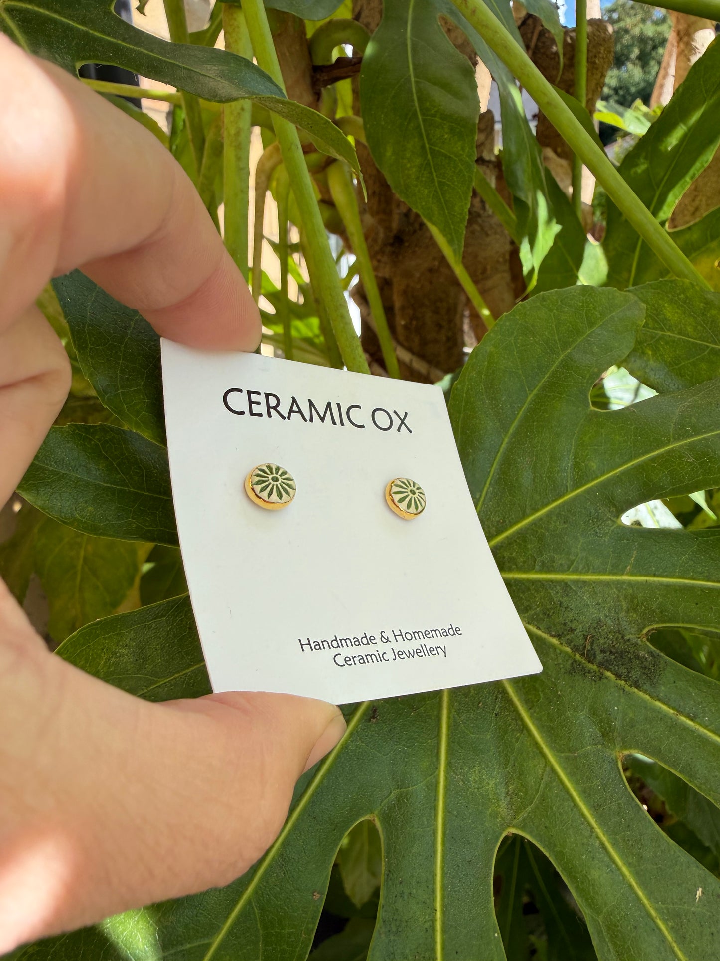 Imprint radial sage green studs