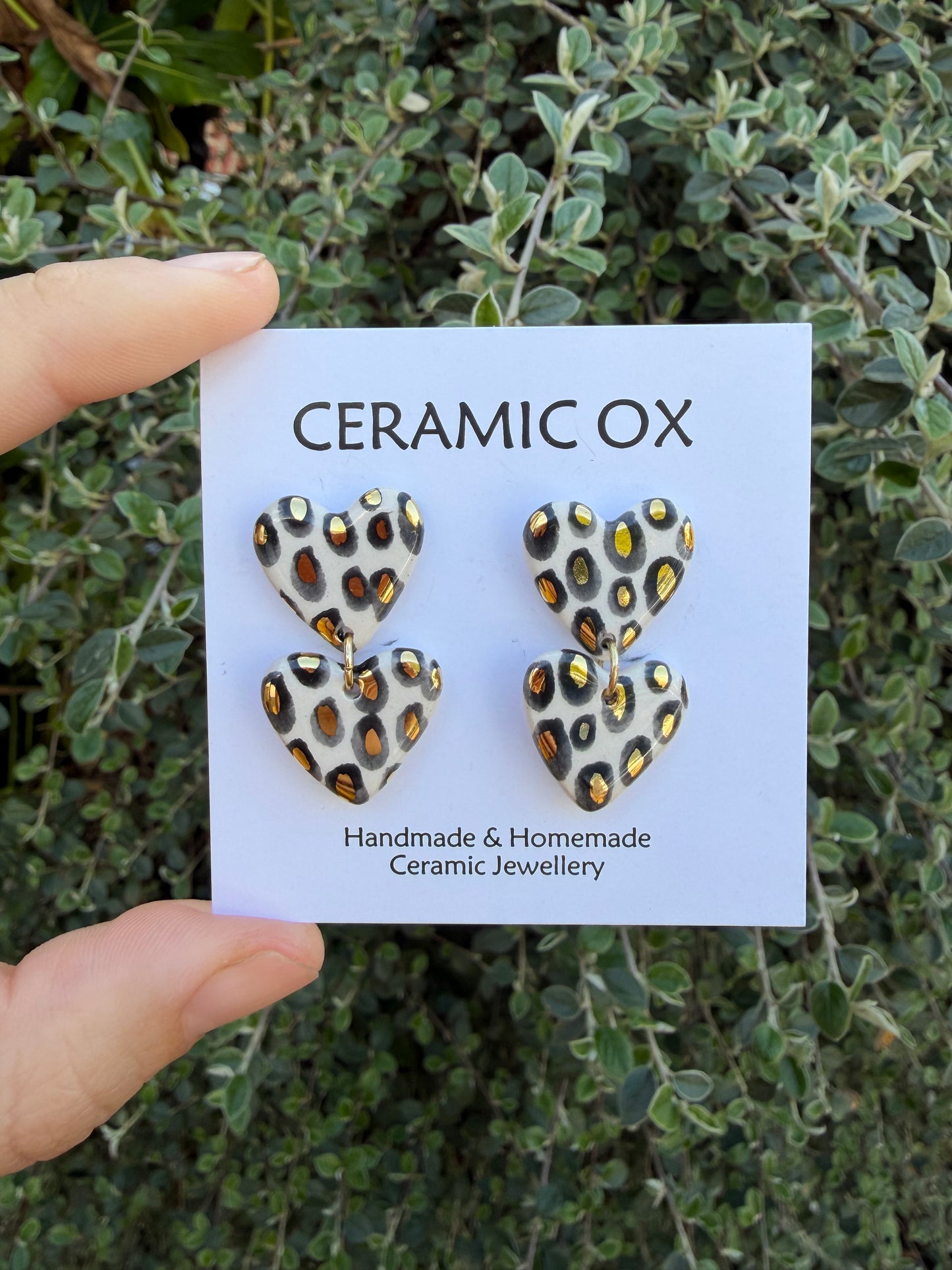 Double heart leopard dangly studs