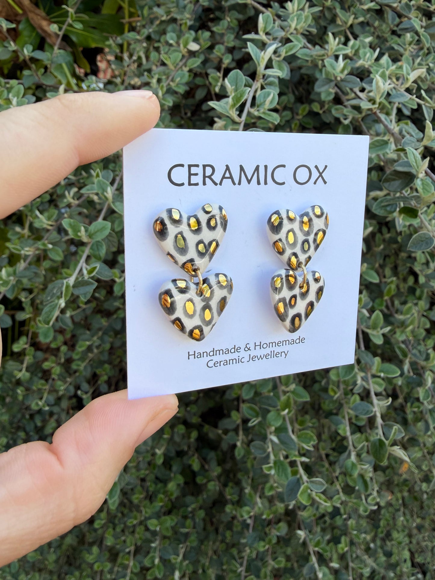 Double heart leopard dangly studs