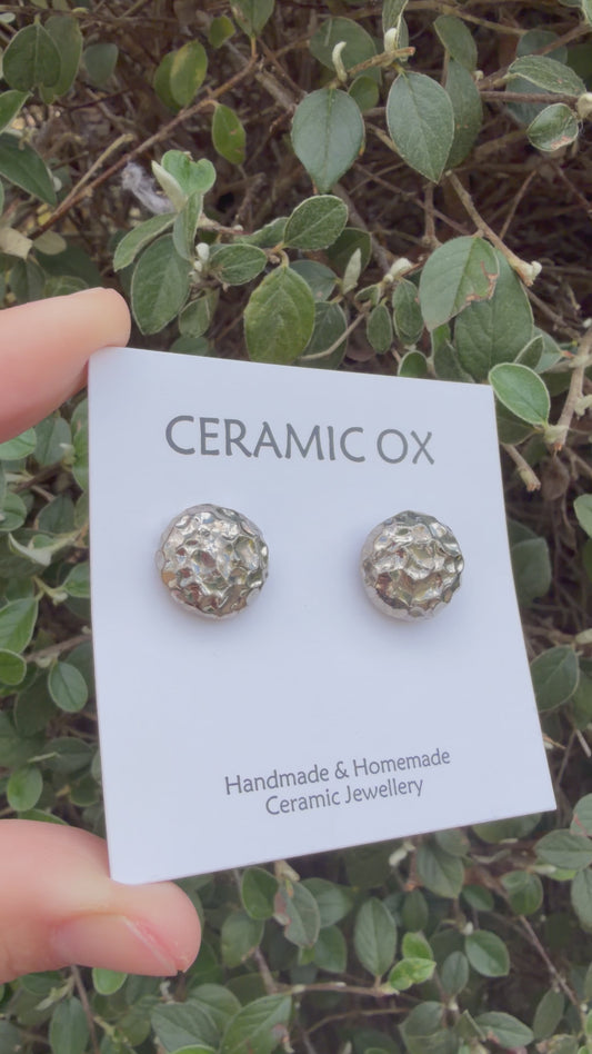 Textured round studs in silver
