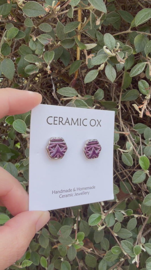 Royal purple hexagon geometric design studs with silver surround