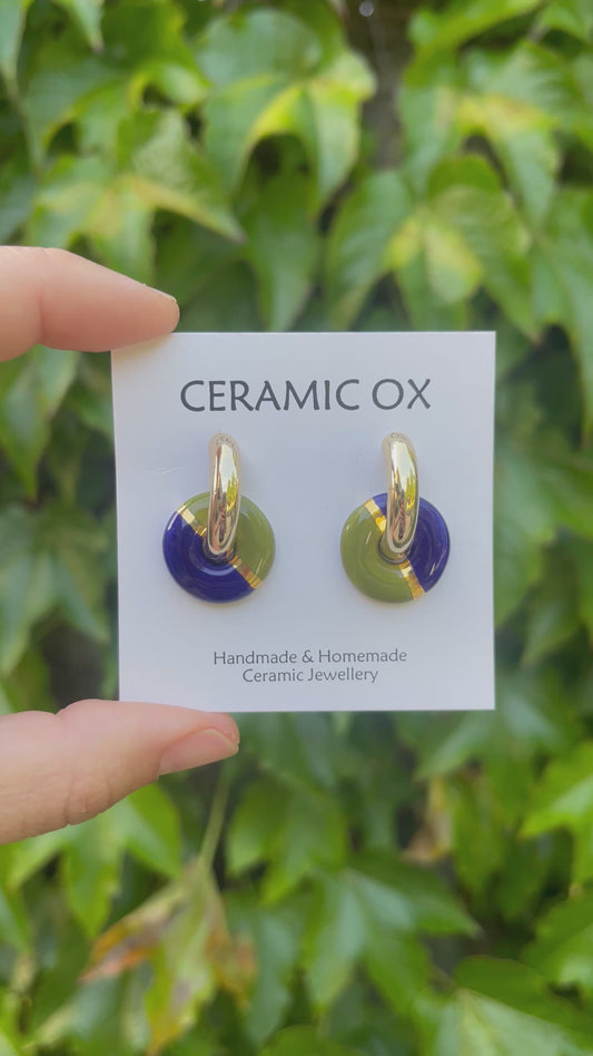 Olive/Cobalt ceramic circles on chunky gold hoop earrings